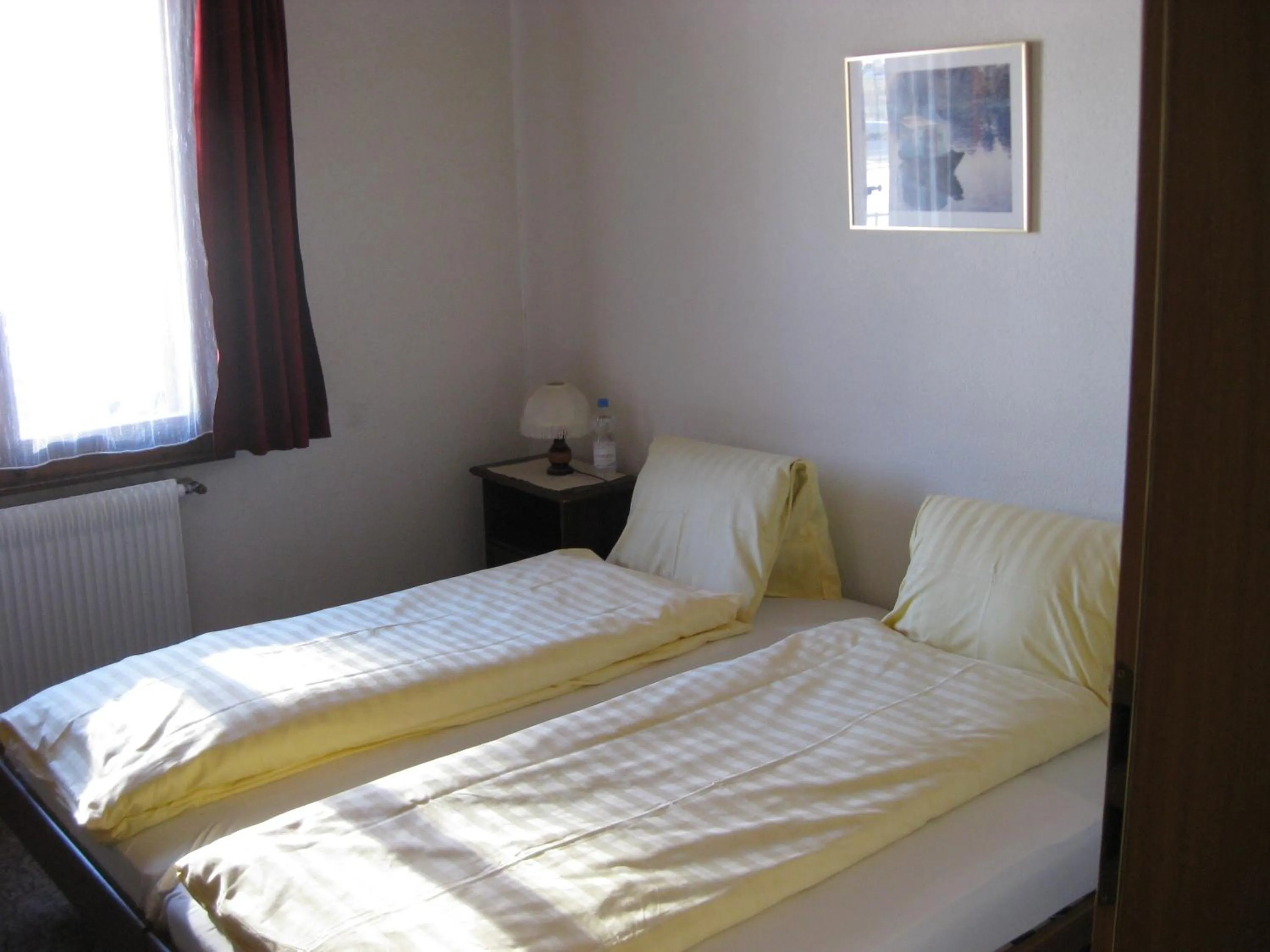 Bed in Hotel Pension Spycher