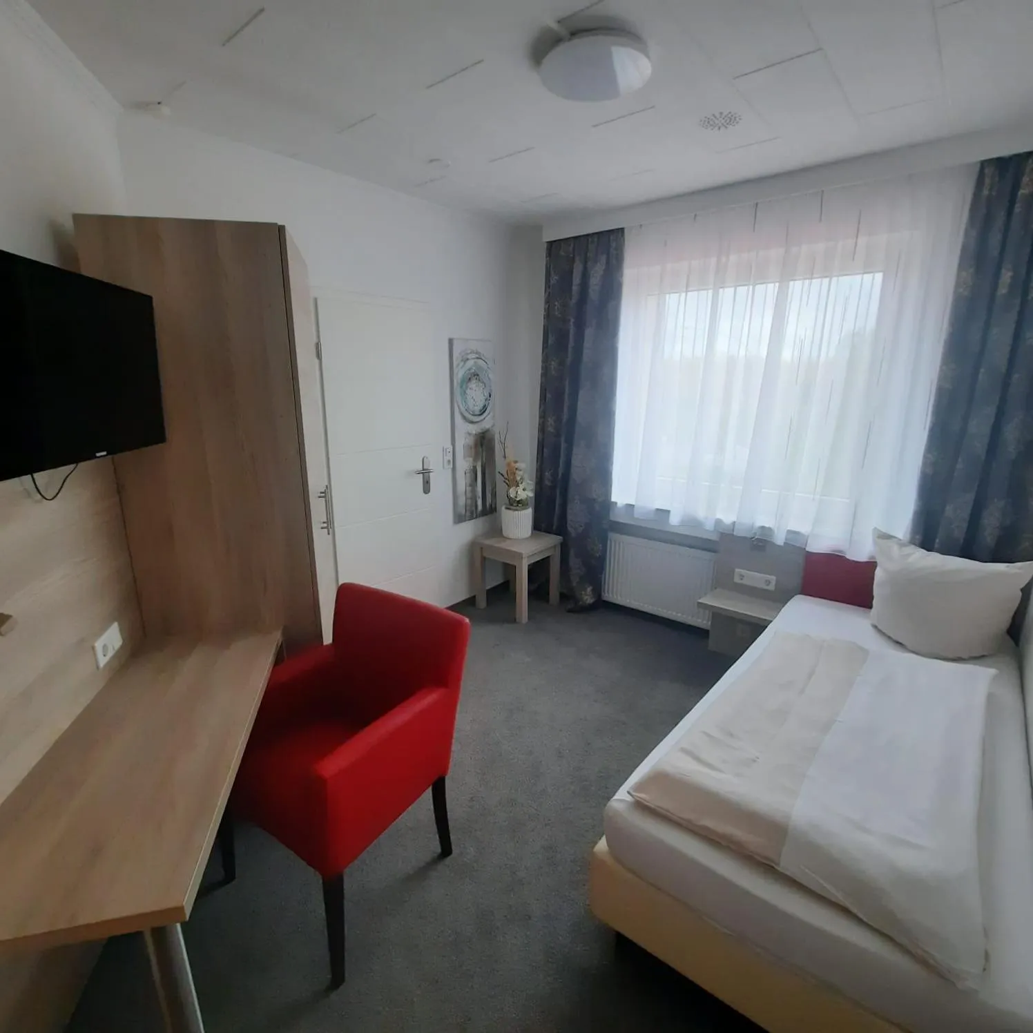 Communal lounge/ TV room, Bed in Eventhaus Schamin