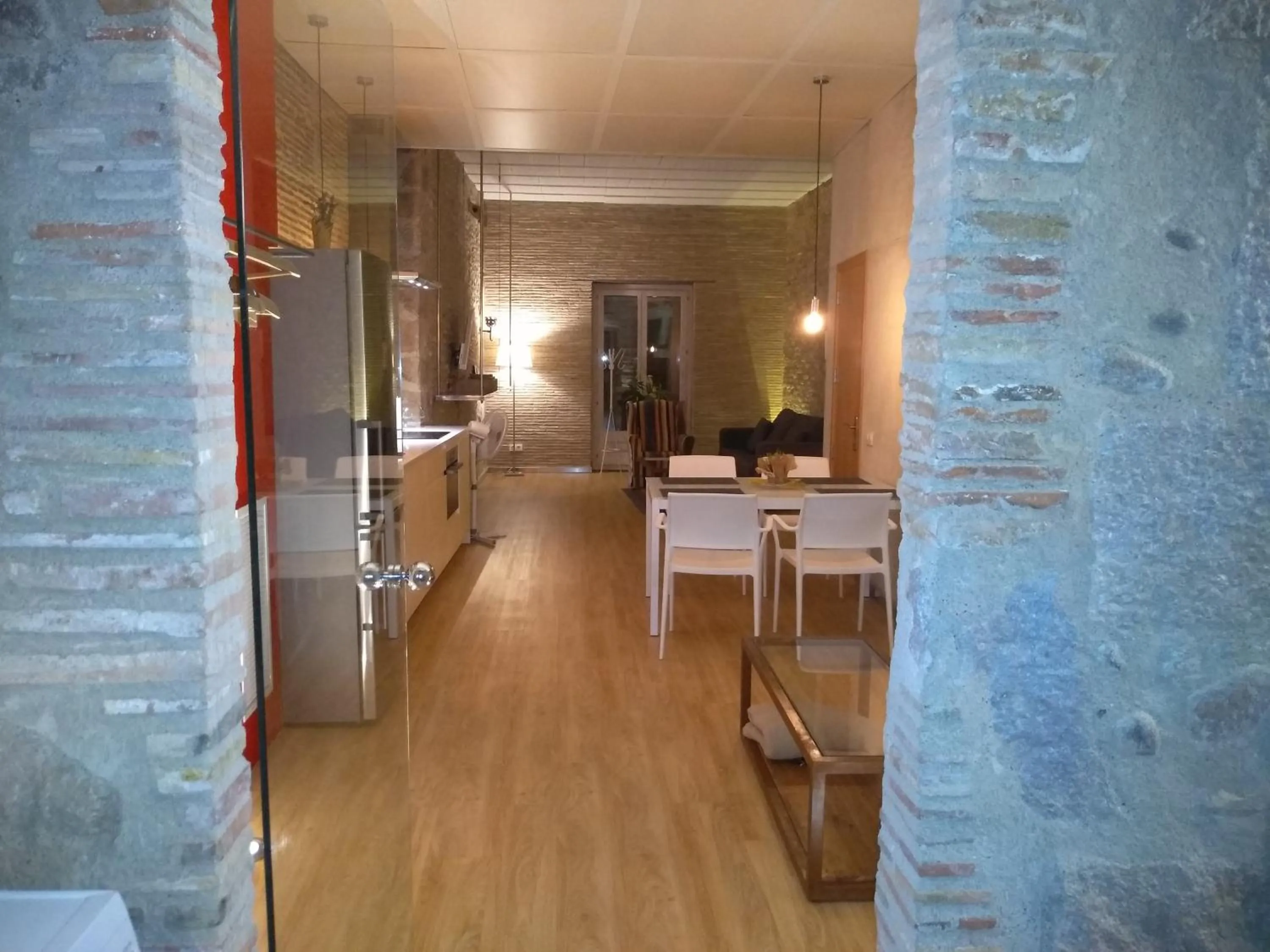 Communal lounge/ TV room in Onyar apartments Rambla de la llibertat 27