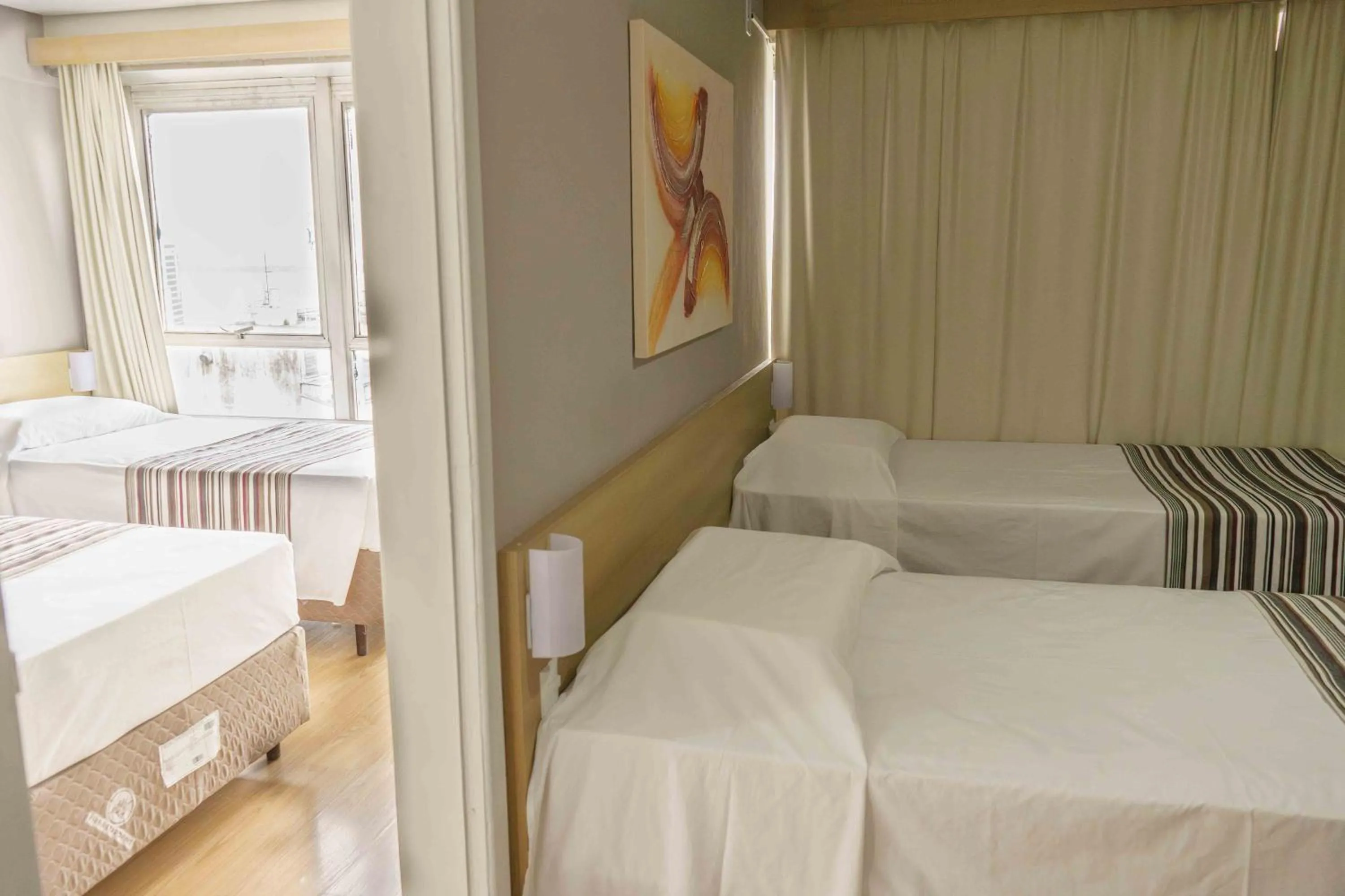 Photo of the whole room, Bed in Hotel Dan Inn Express Porto Alegre by Nacional Inn -Próximo à Arena do Grêmio, Parque Harmonia e Réveillon na Orla do Guaíba