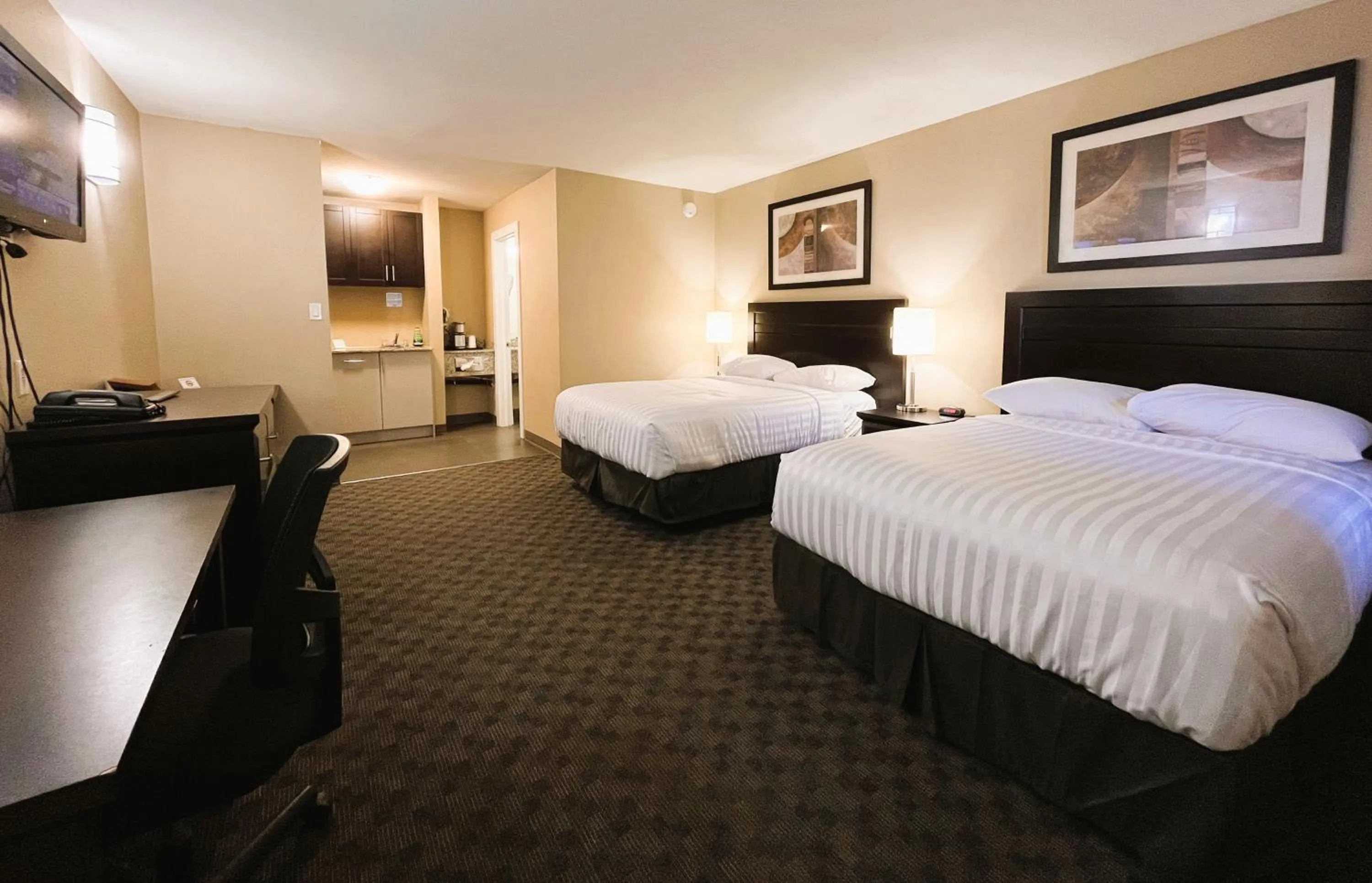 Photo of the whole room, Bed in BCMInns - Peace River