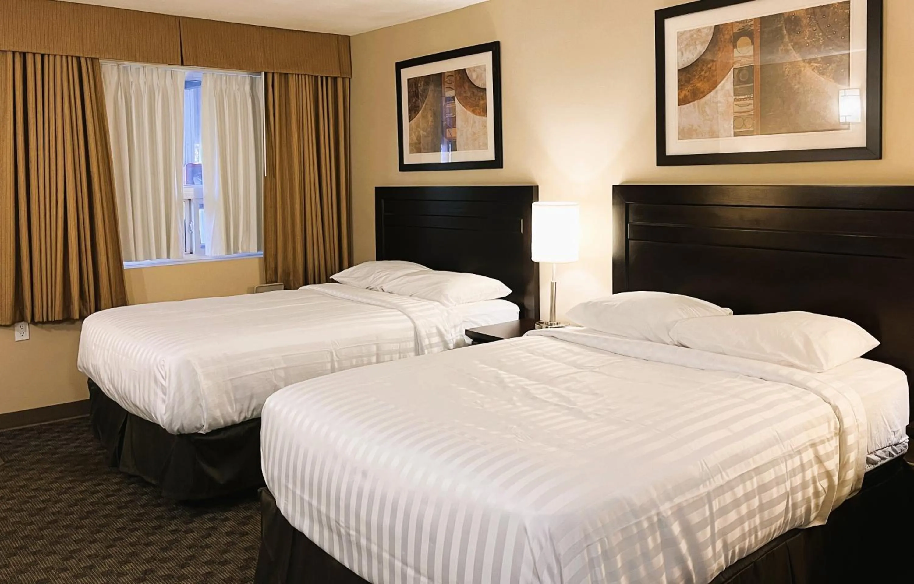 Bedroom, Bed in BCMInns - Peace River