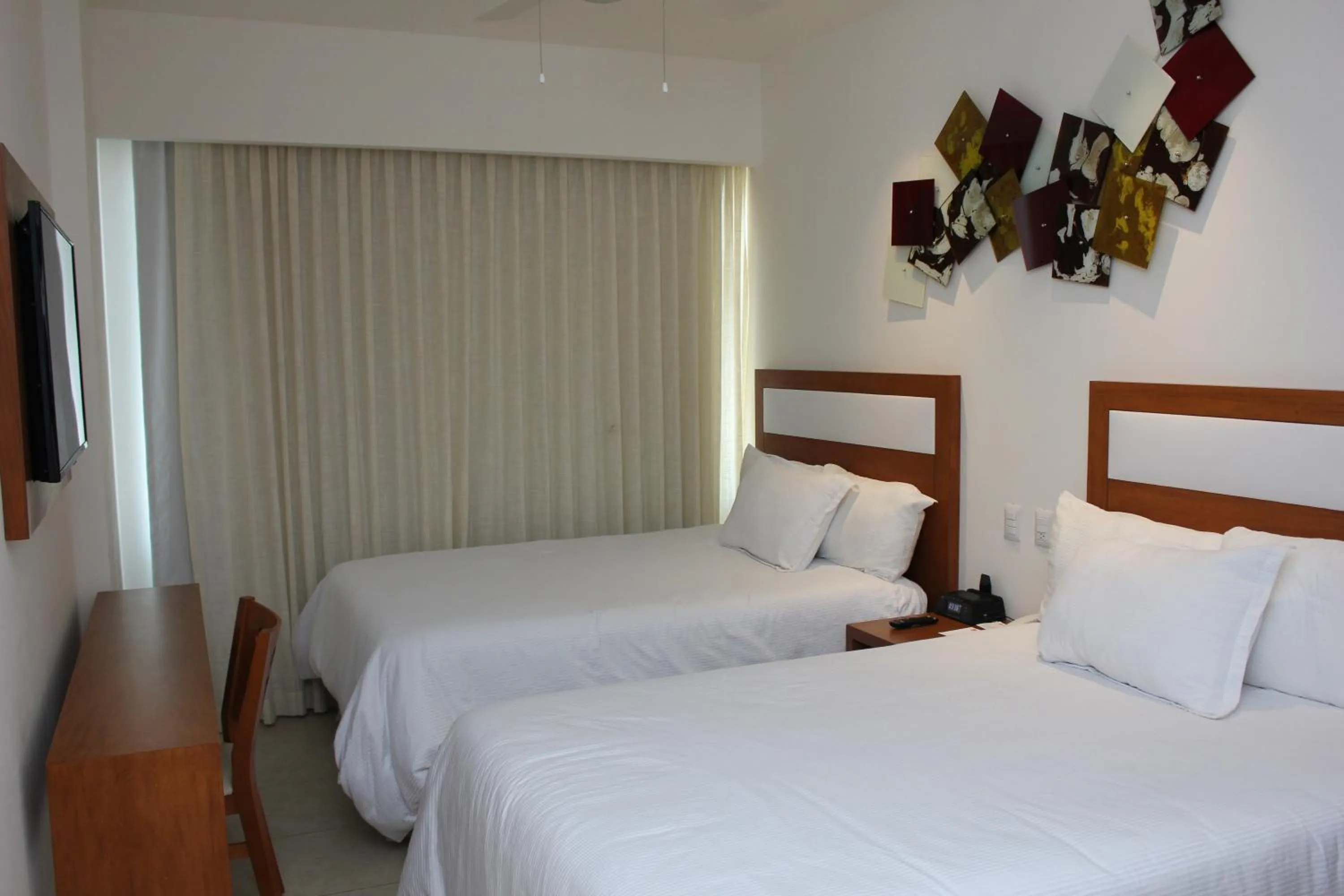 Bedroom, Bed in Ambiance Suites