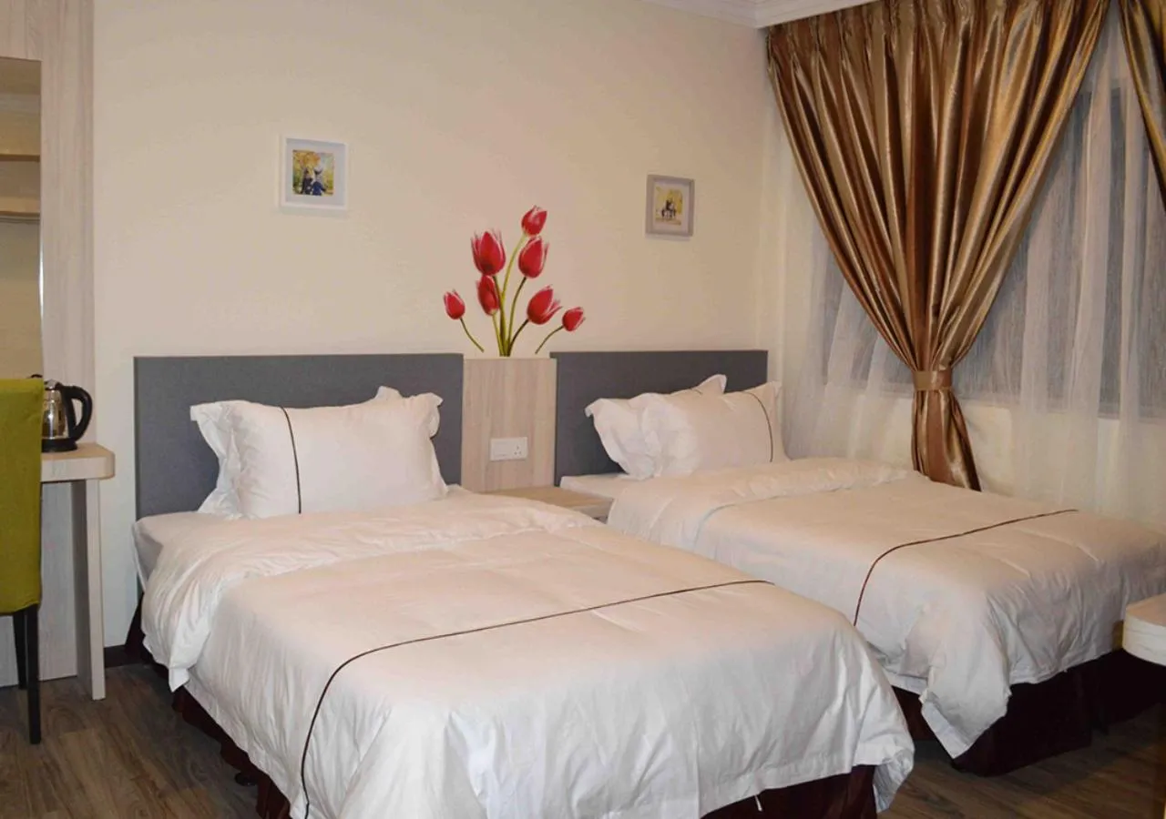 Bed in Angsoka Hotel