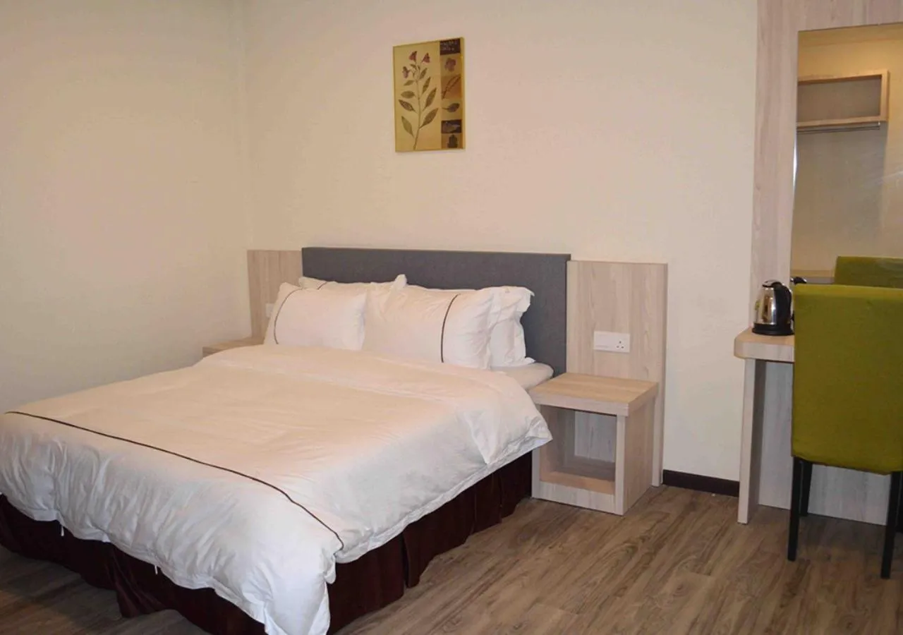 Bed in Angsoka Hotel