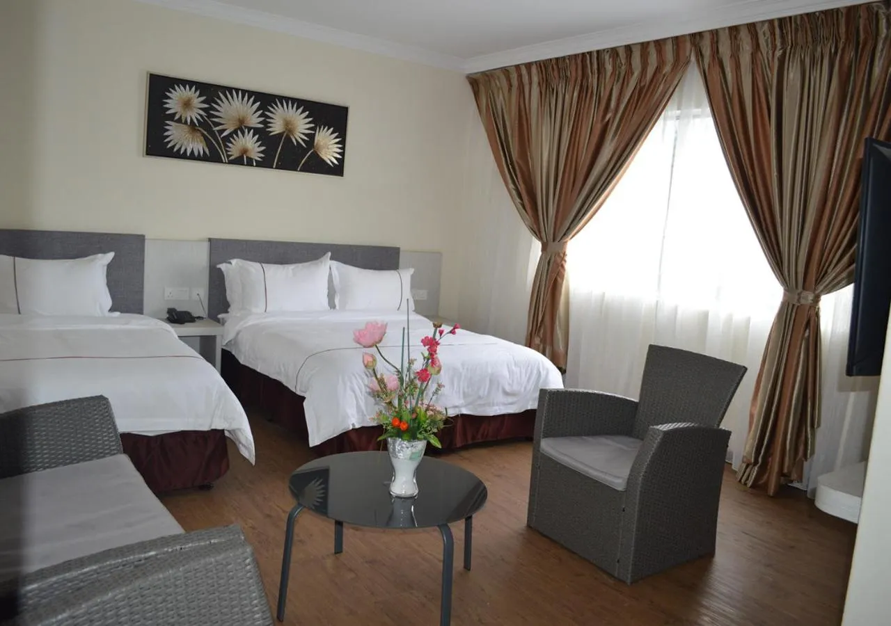 Bed in Angsoka Hotel