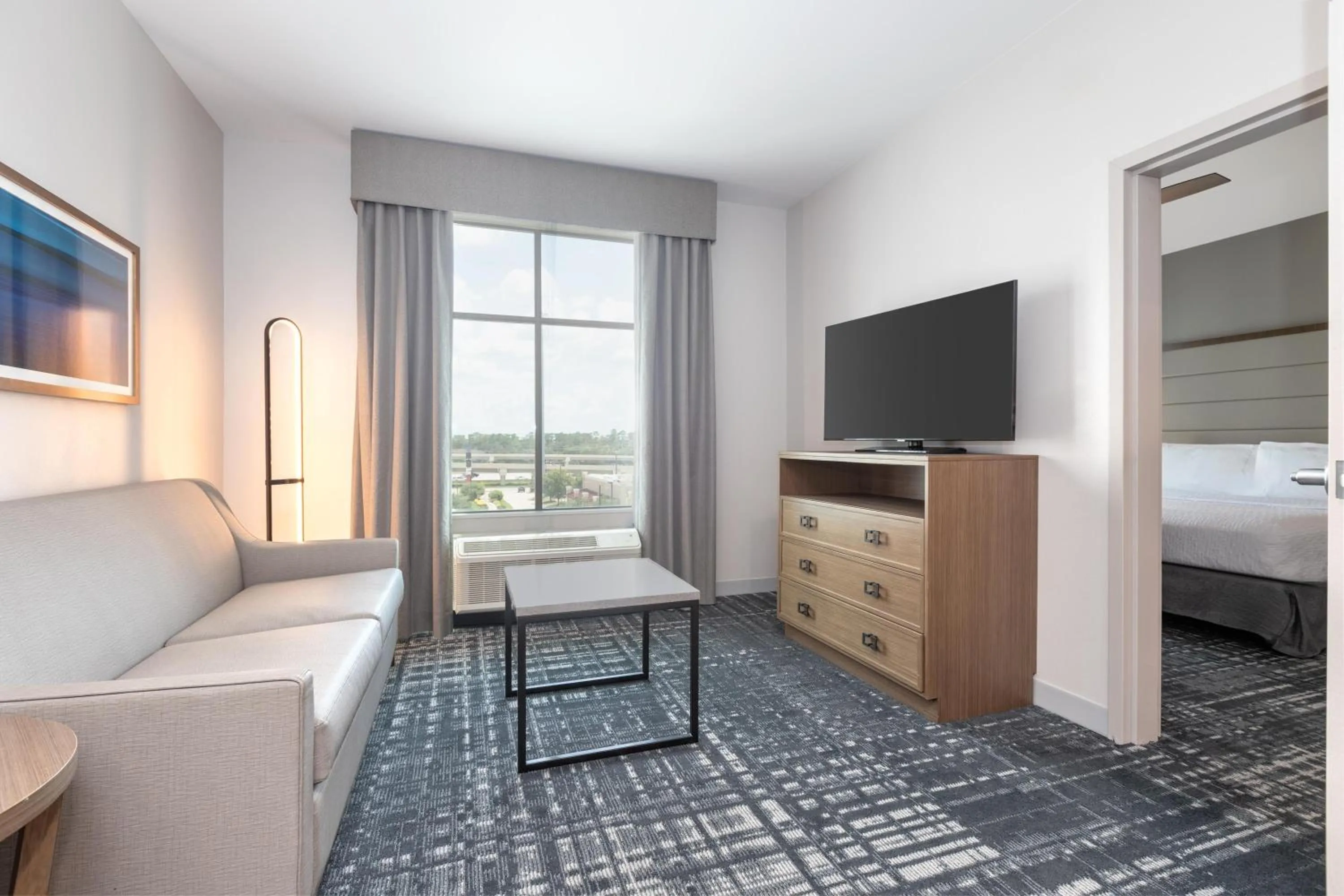 Living room, Bed in Homewood Suites By Hilton Houston Memorial