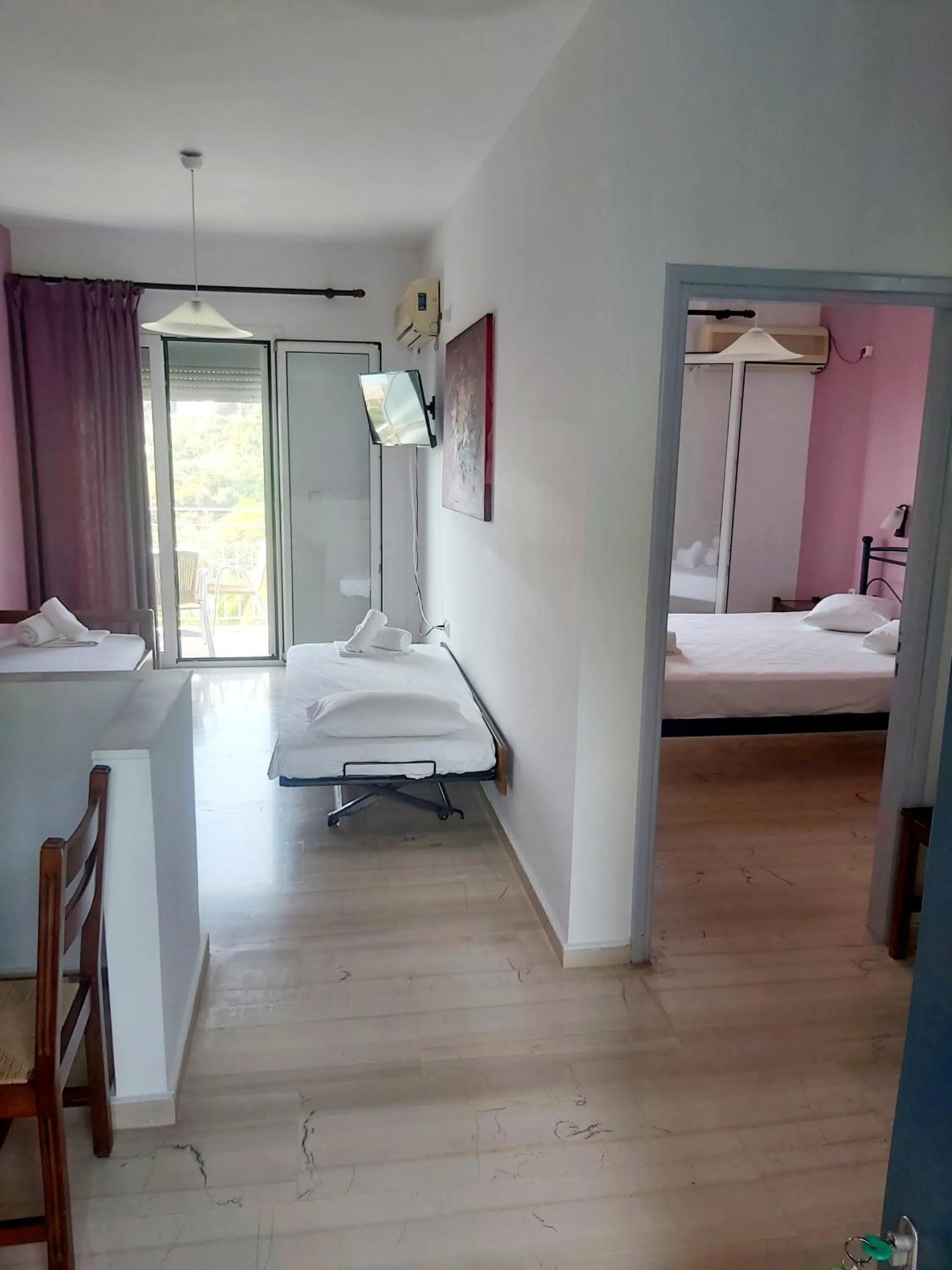 Bed in Filoxenia Hotel & Apartments