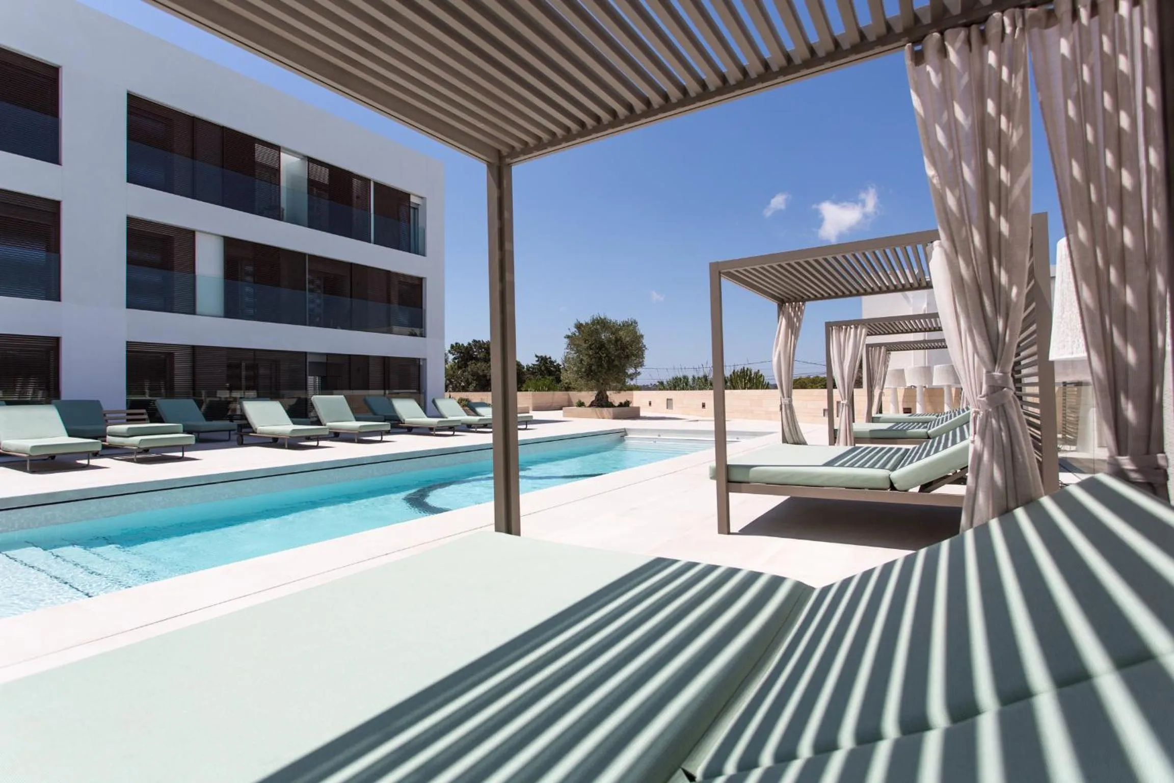 Swimming pool in Sa Pedrera Suites & Spa