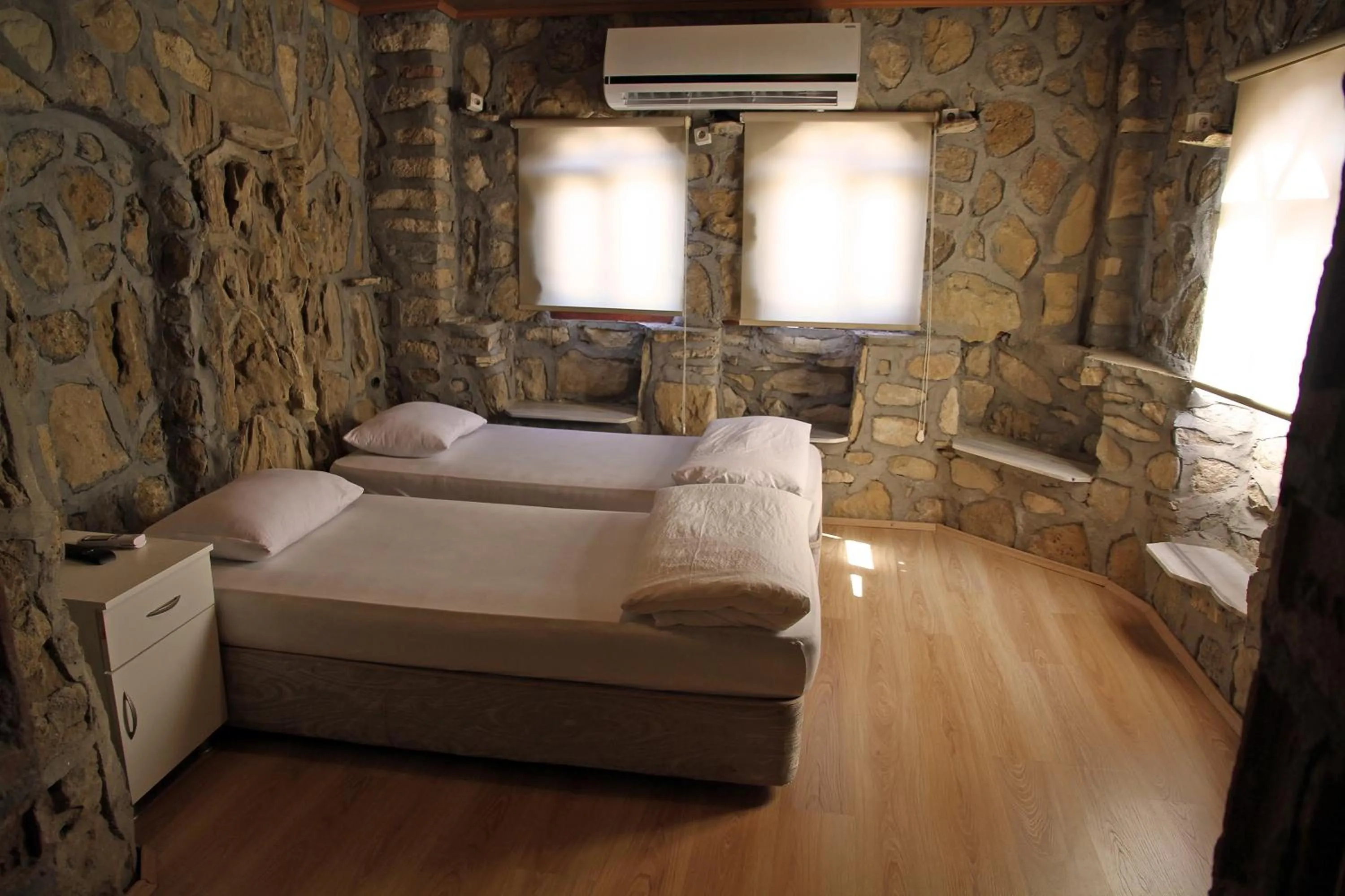 Photo of the whole room, Bed in Aqua Boss Hotel