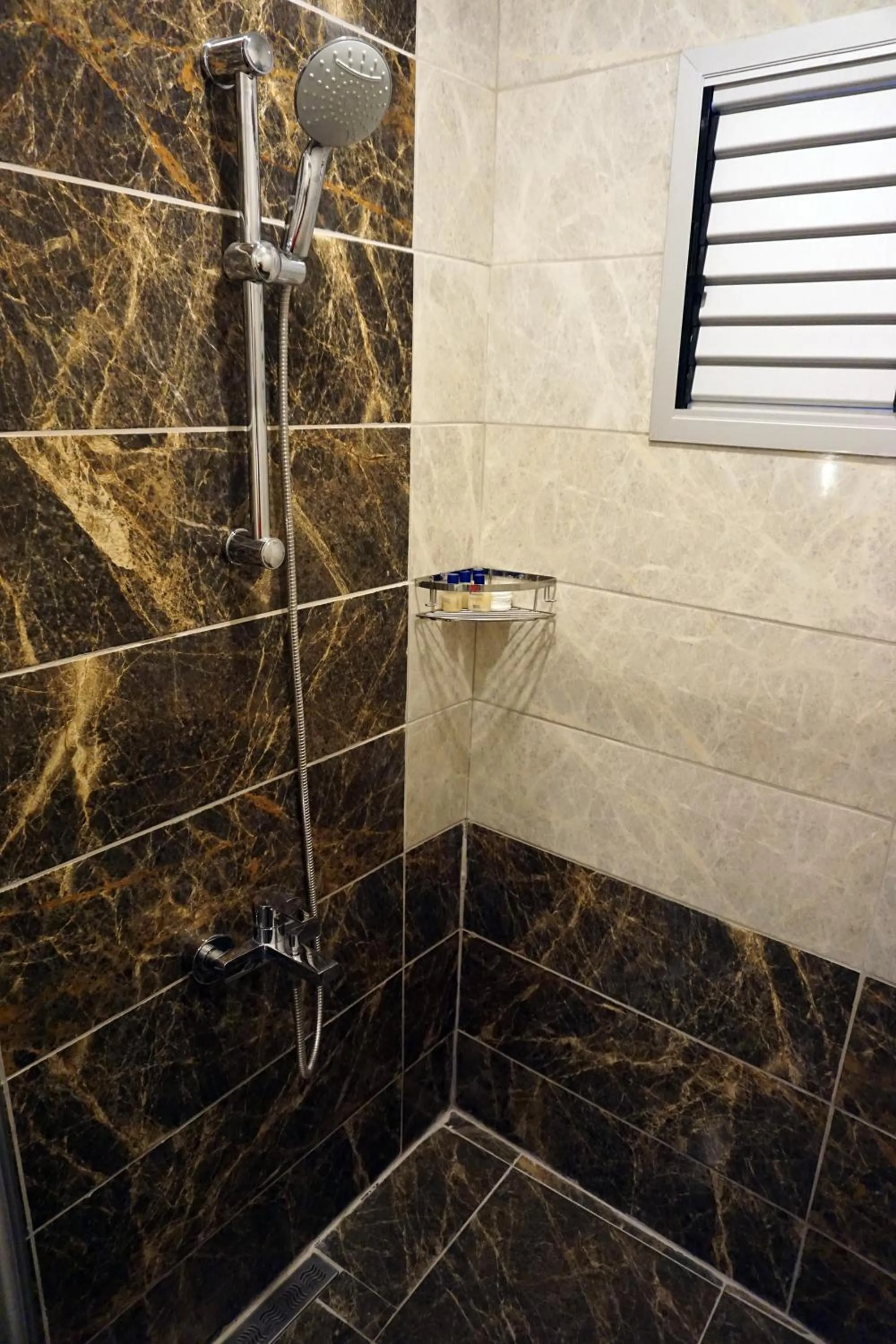 Shower in Aqua Boss Hotel