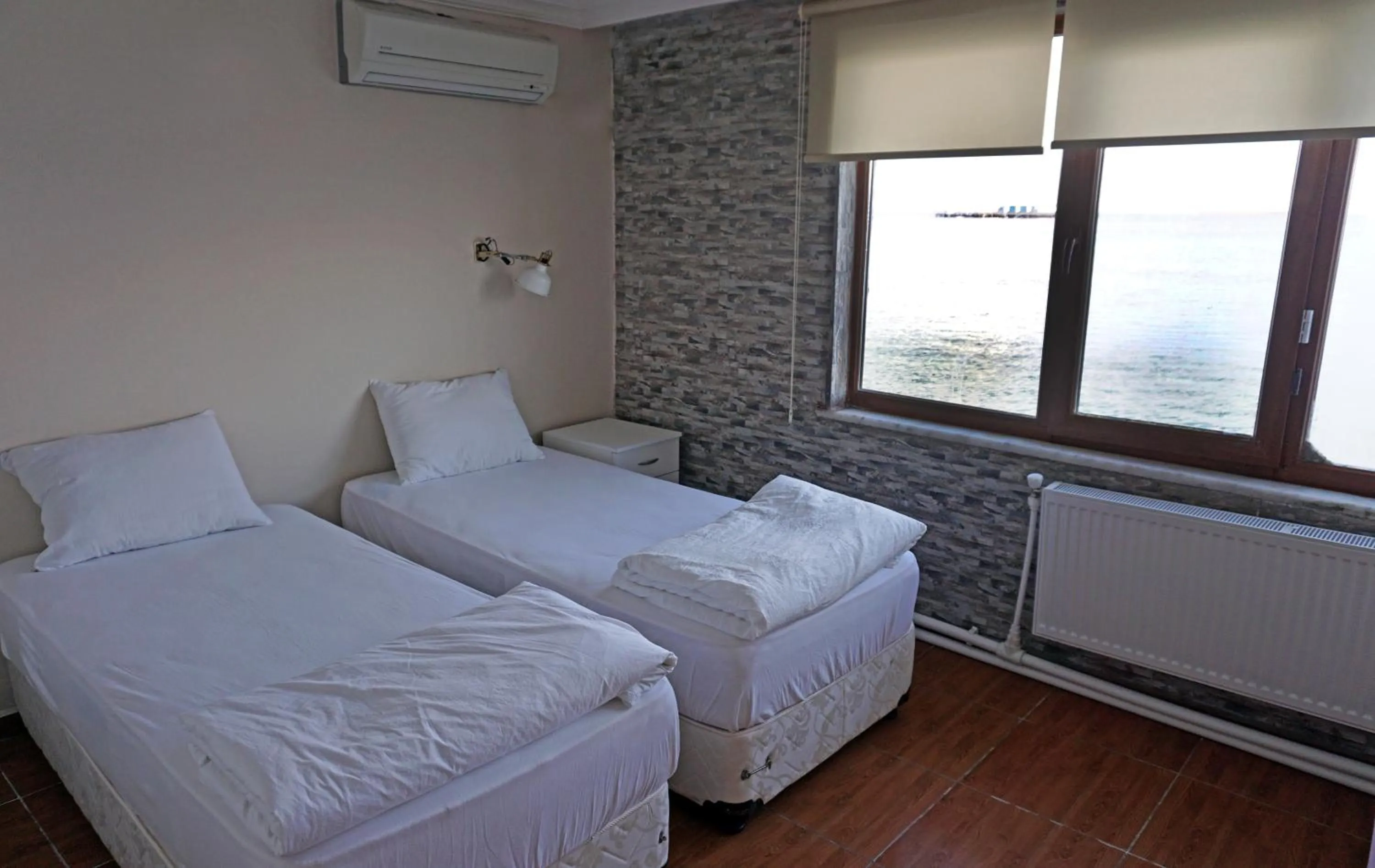 Living room, Bed in Aqua Boss Hotel