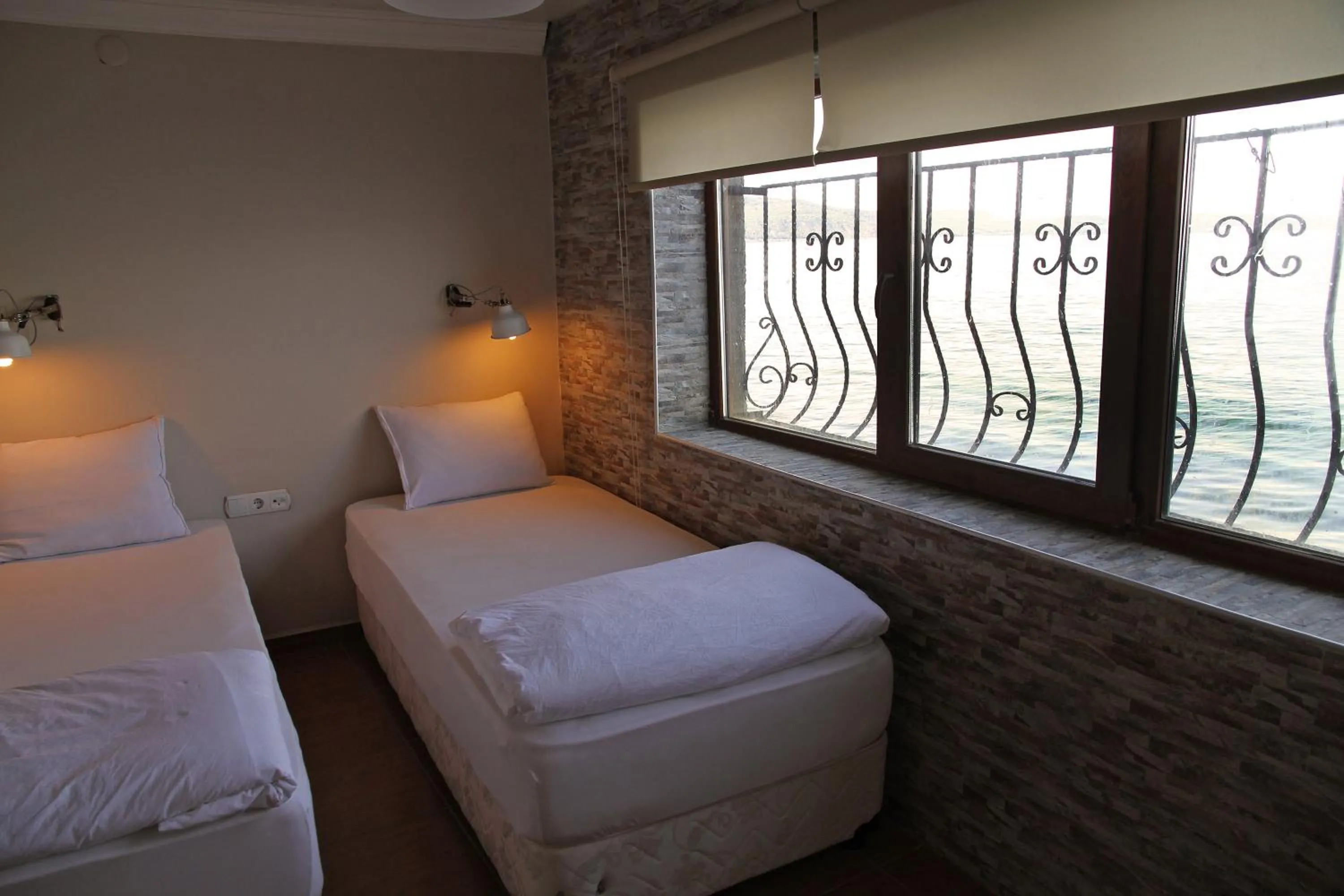 Photo of the whole room, Bed in Aqua Boss Hotel