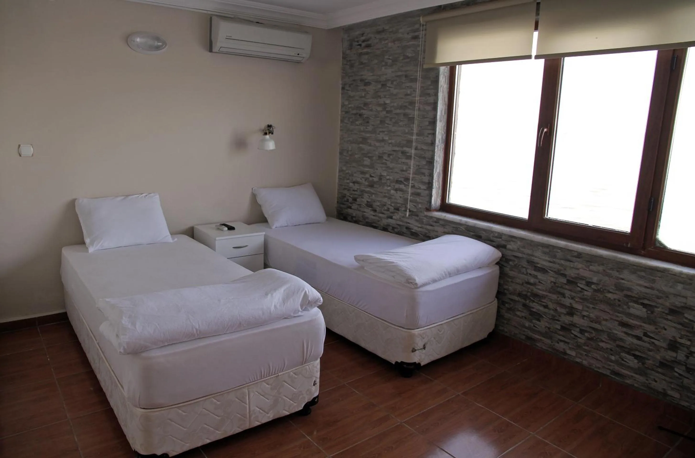 Photo of the whole room, Bed in Aqua Boss Hotel