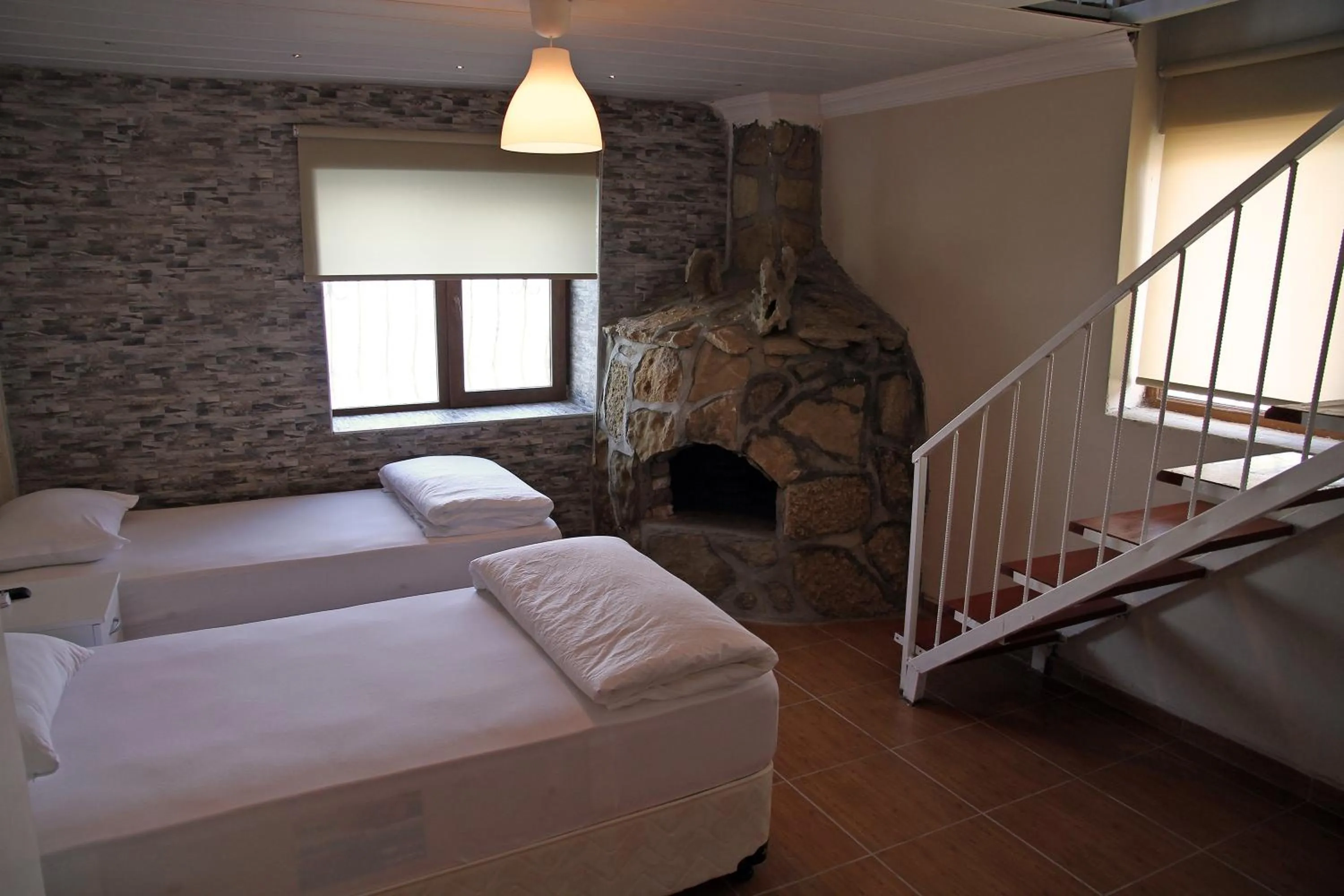 Photo of the whole room, Bed in Aqua Boss Hotel