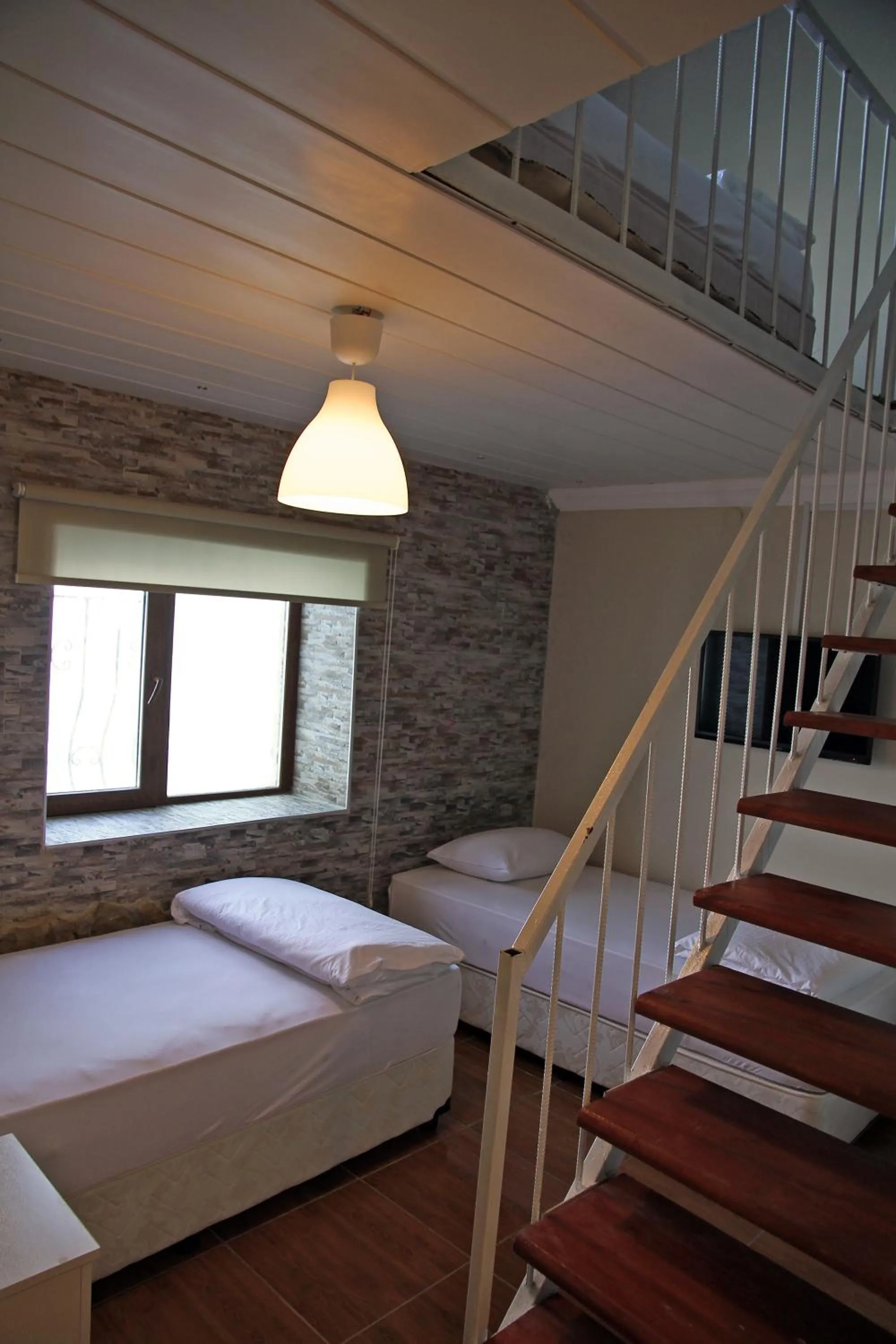 Photo of the whole room, Bed in Aqua Boss Hotel