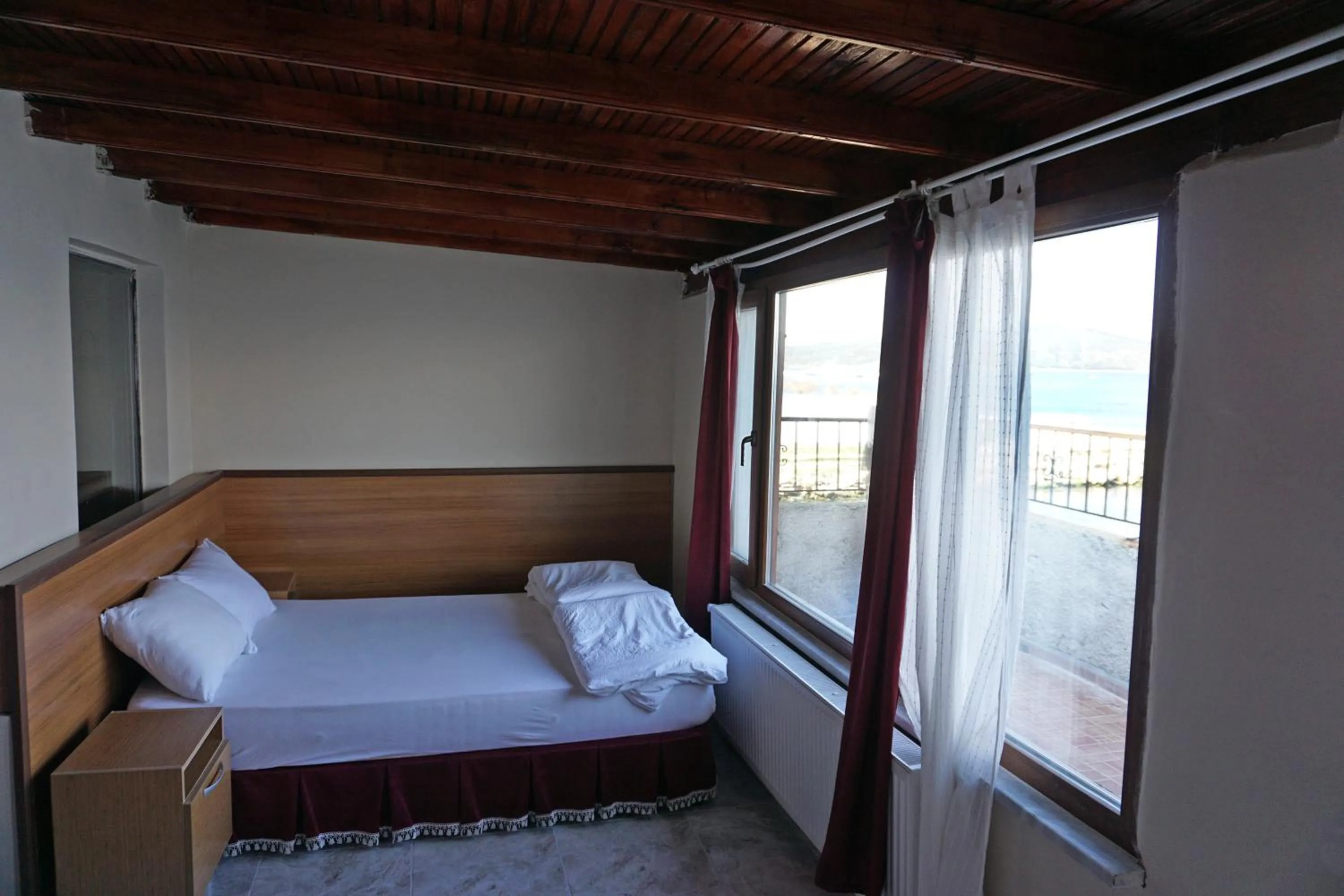 Balcony/Terrace, Bed in Aqua Boss Hotel