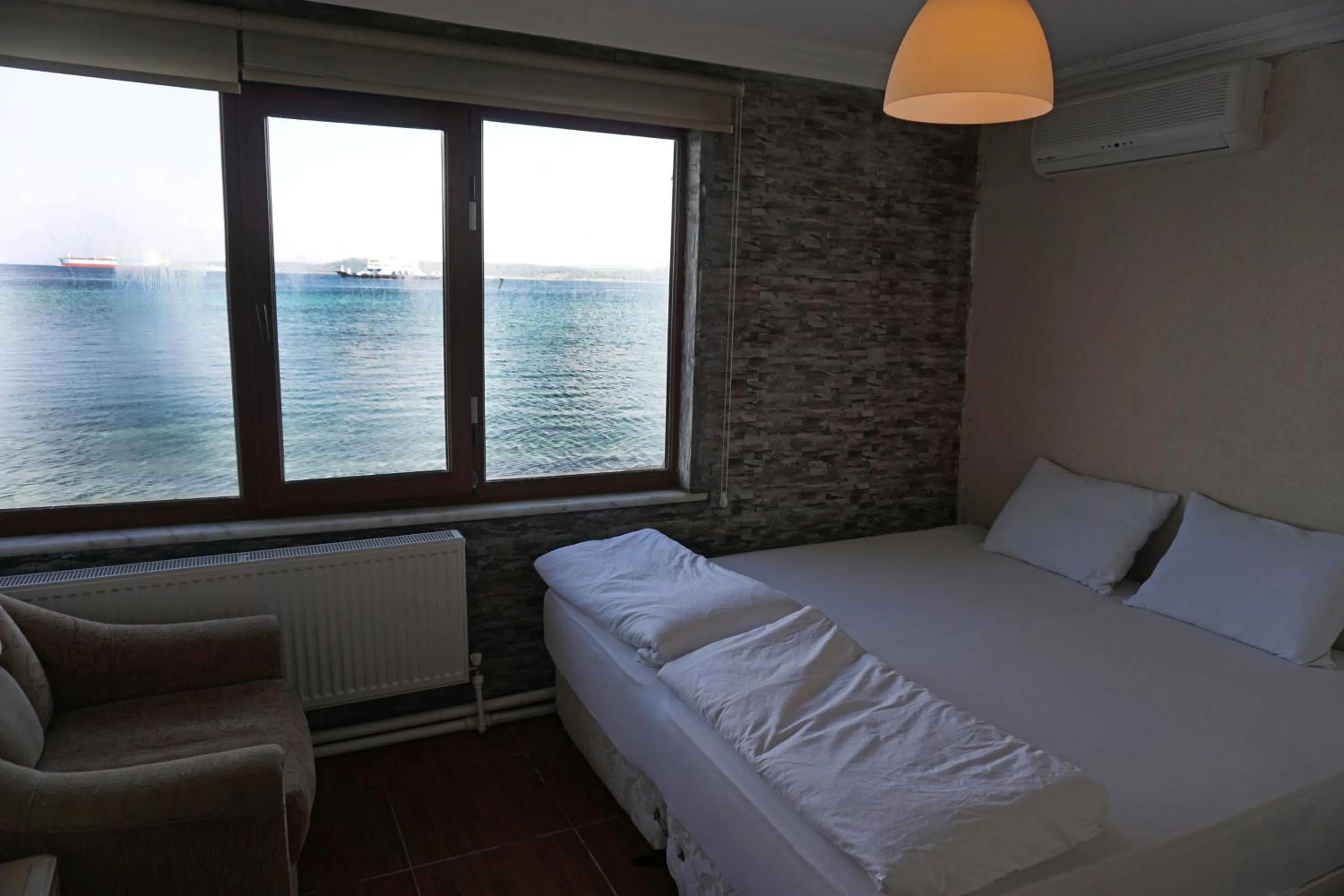 Living room, Bed in Aqua Boss Hotel