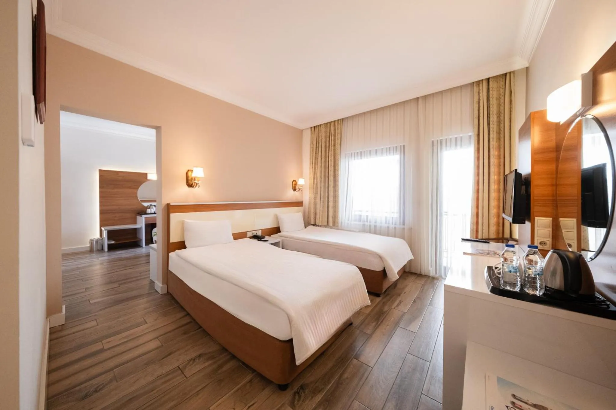 Bed in Iris Hotel & Spa