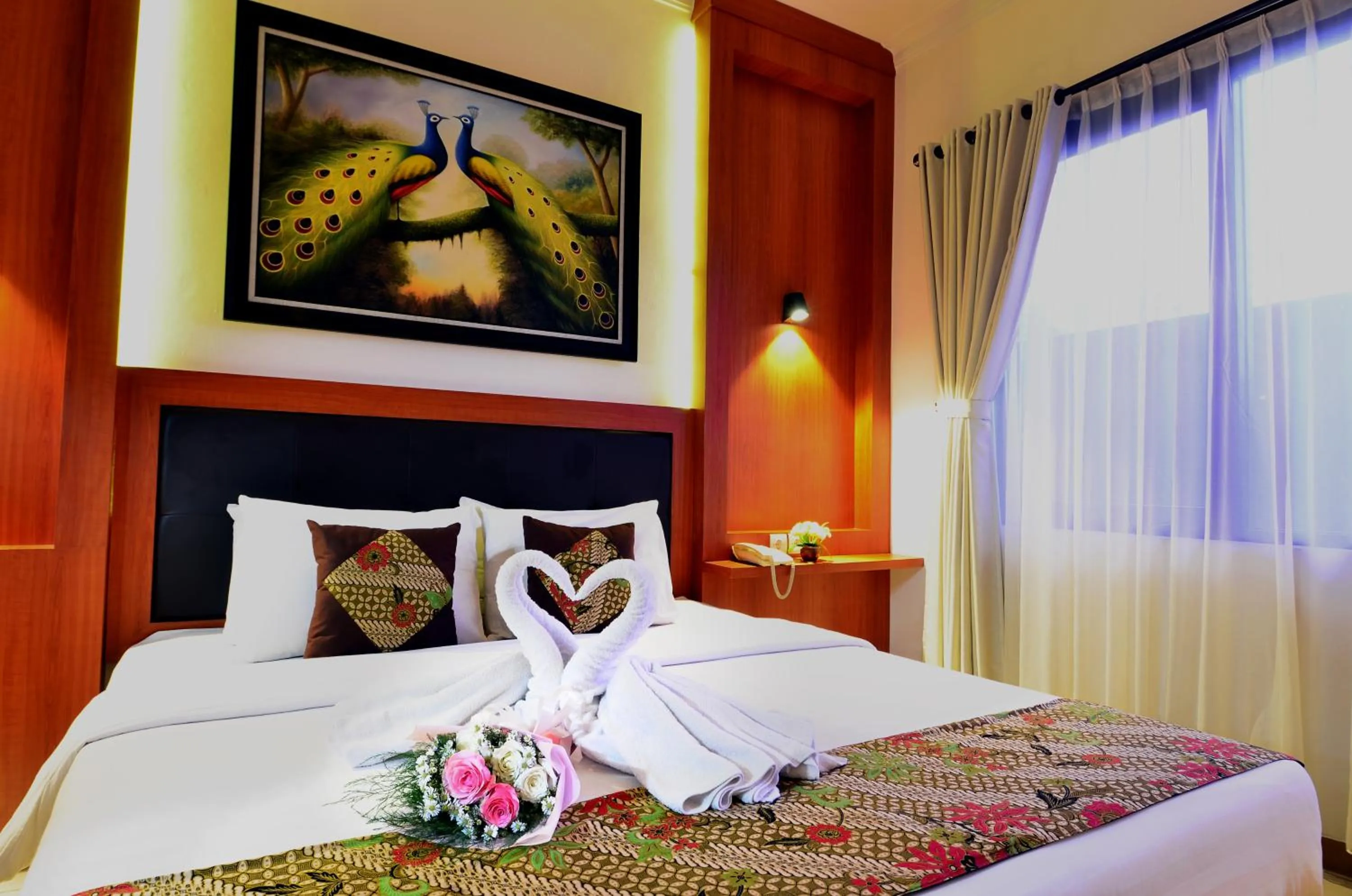 Bedroom, Bed in Griya Sentana Hotel