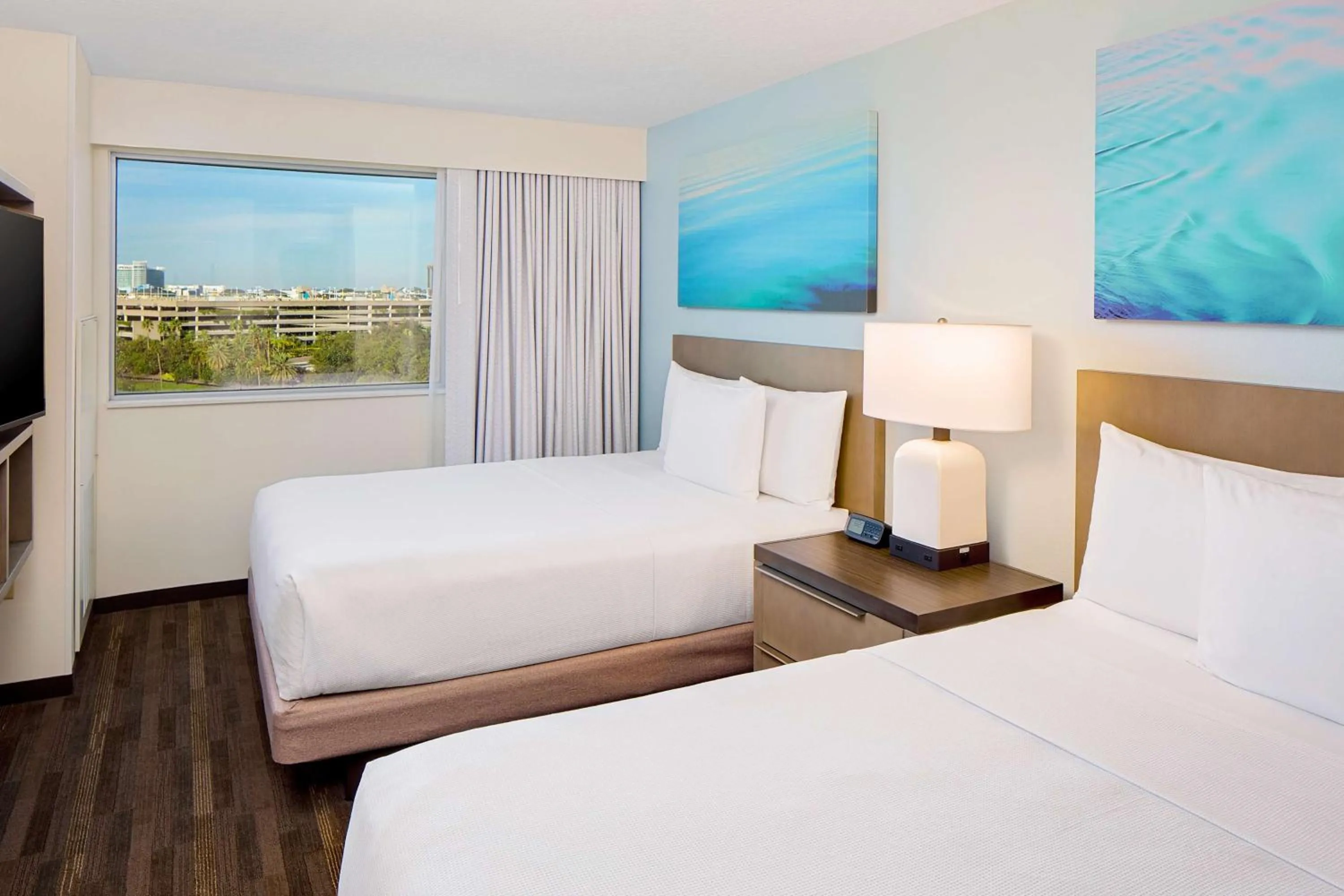 Photo of the whole room, Bed in Hyatt House across from Universal Orlando Resort