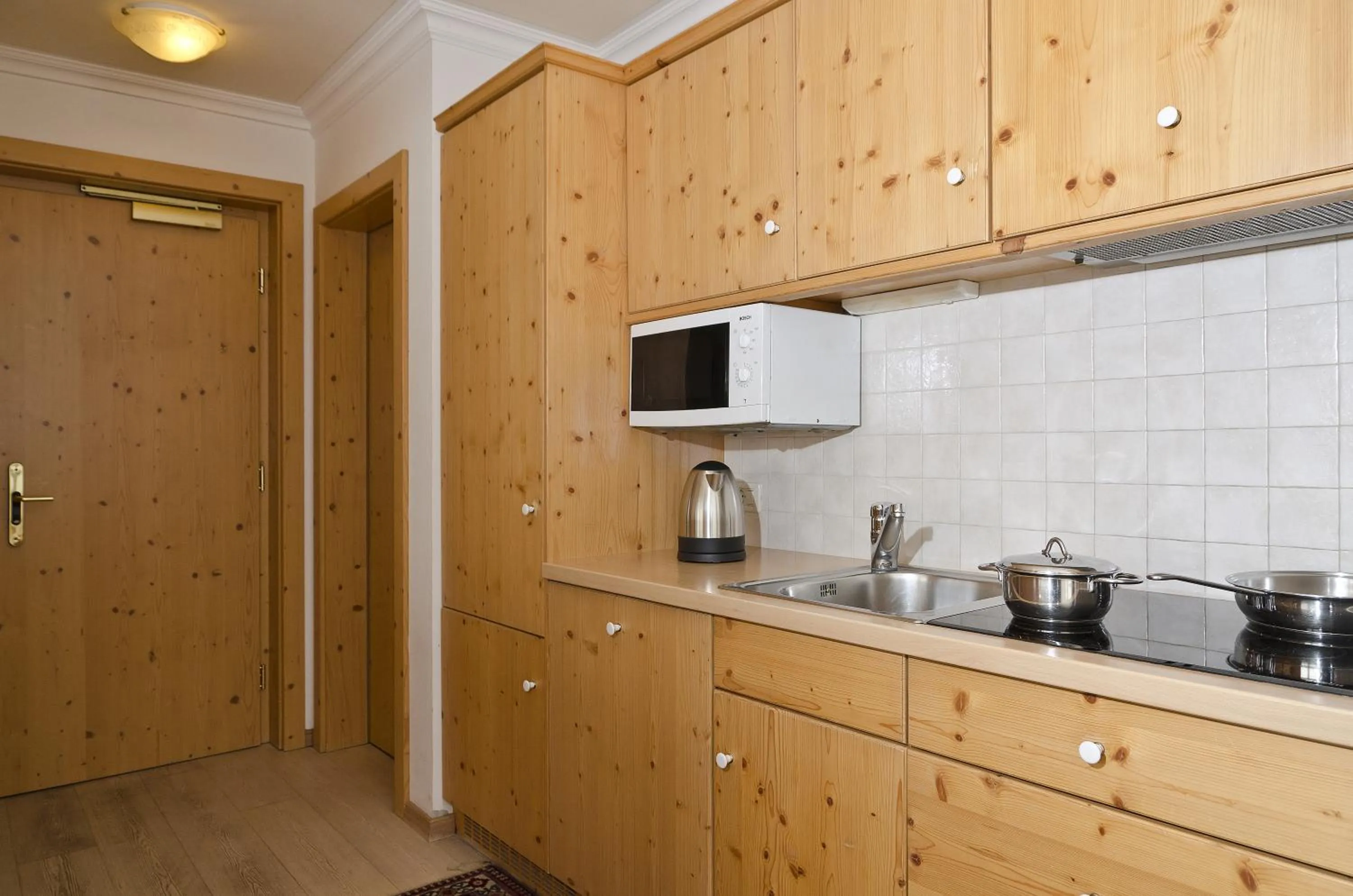 Kitchen or kitchenette in Residence Cesa Rives