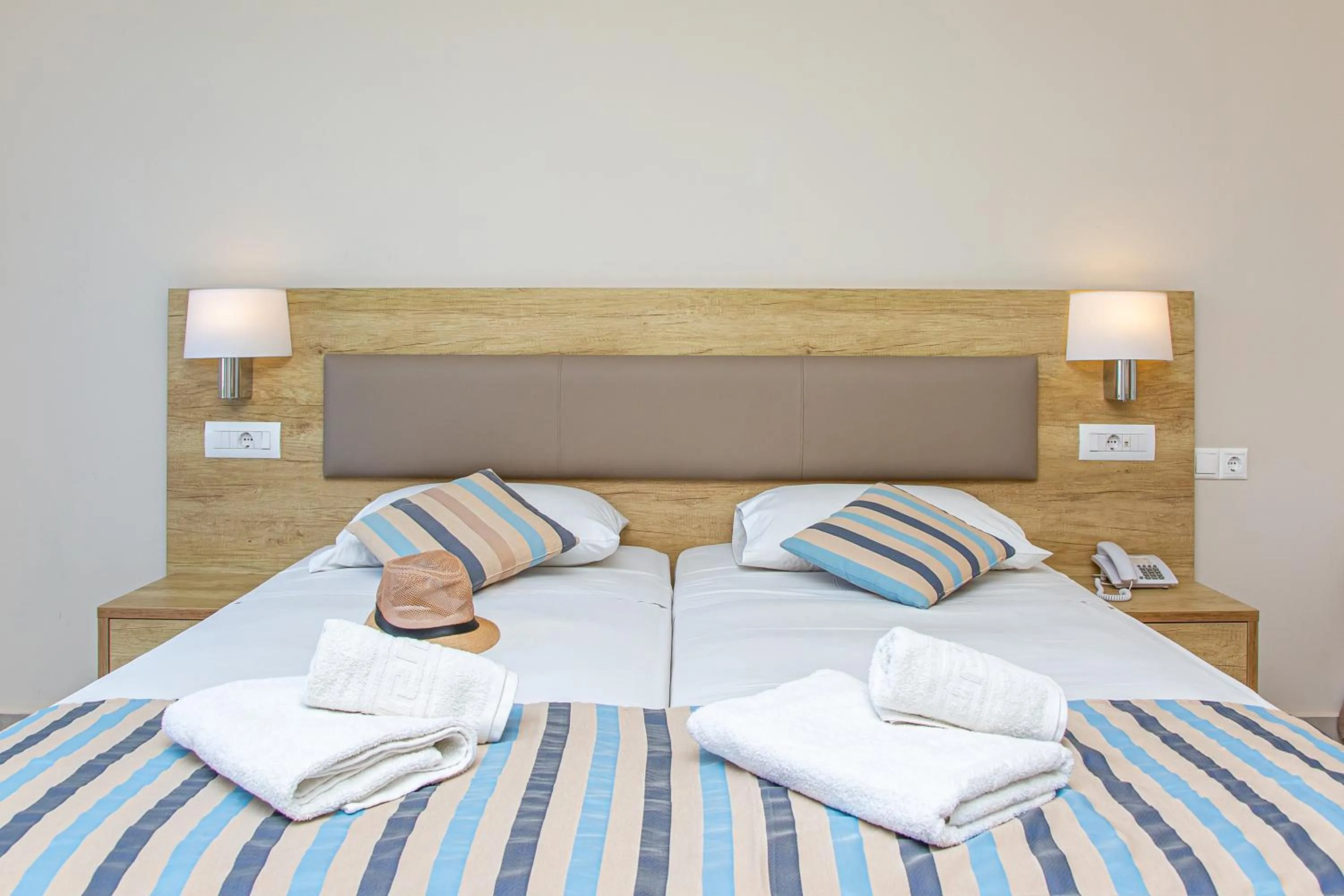 Bed in Theo Star Beach Hotel