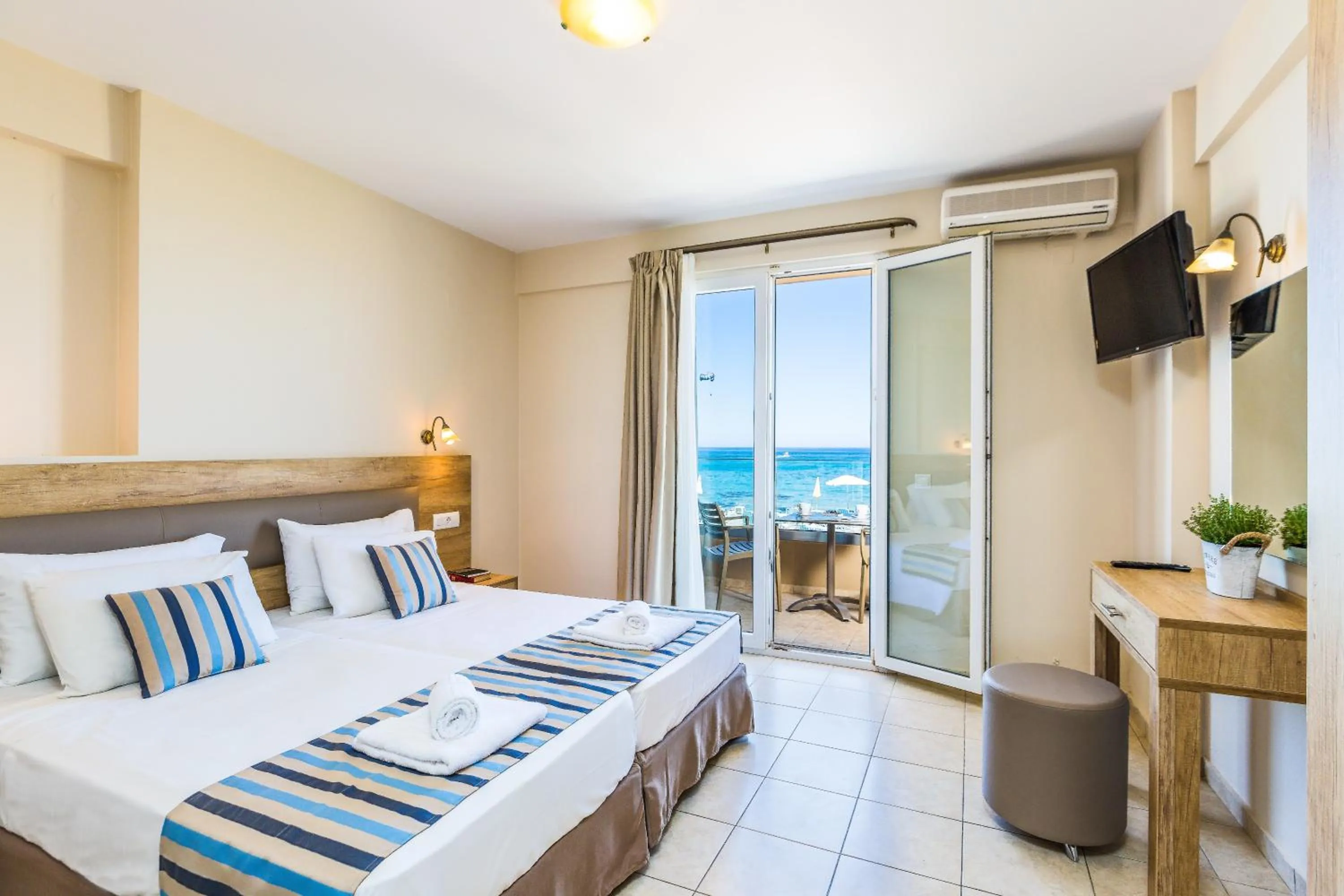 Bed in Theo Star Beach Hotel