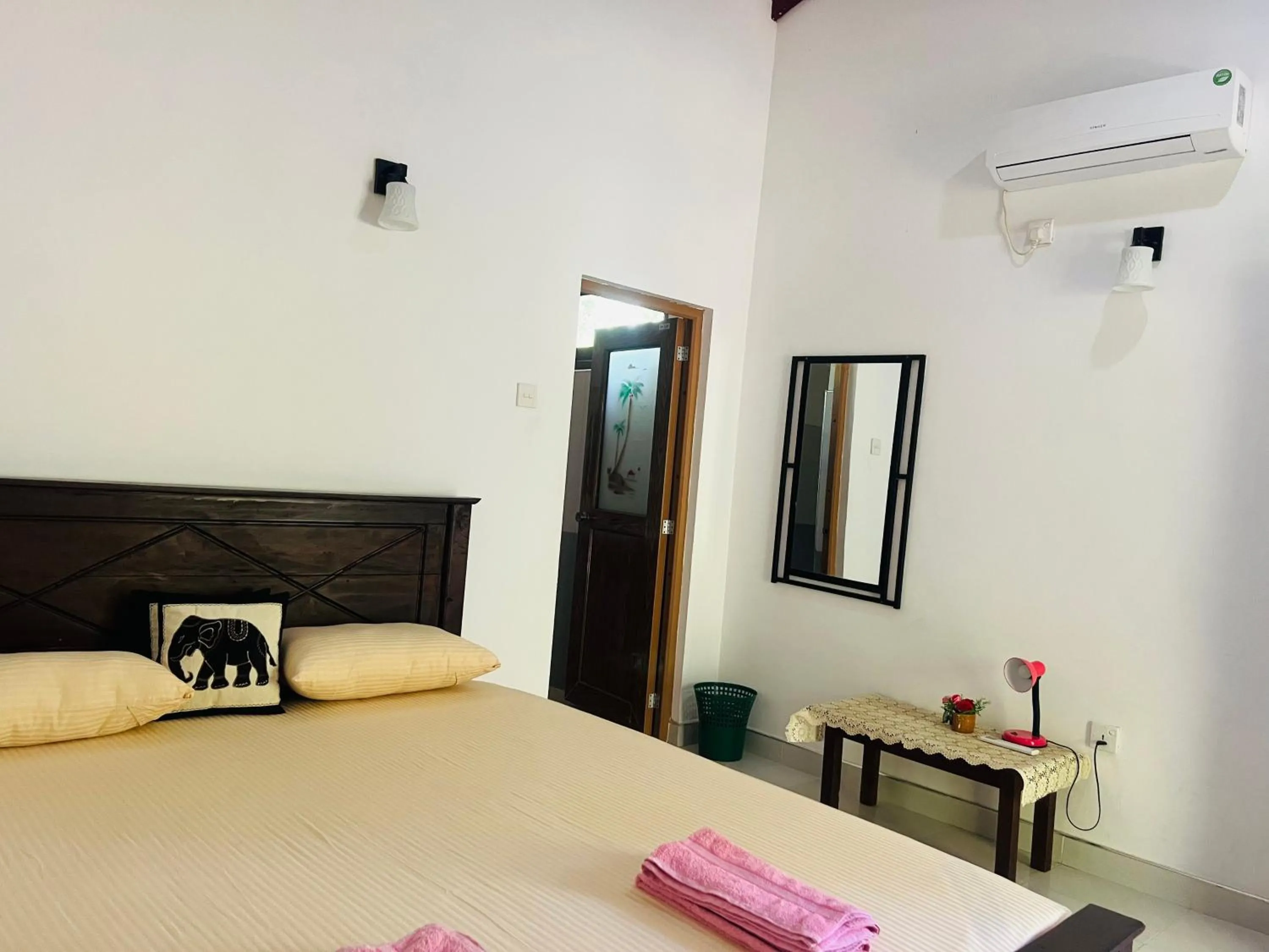 Photo of the whole room, Bed in Harini Villa