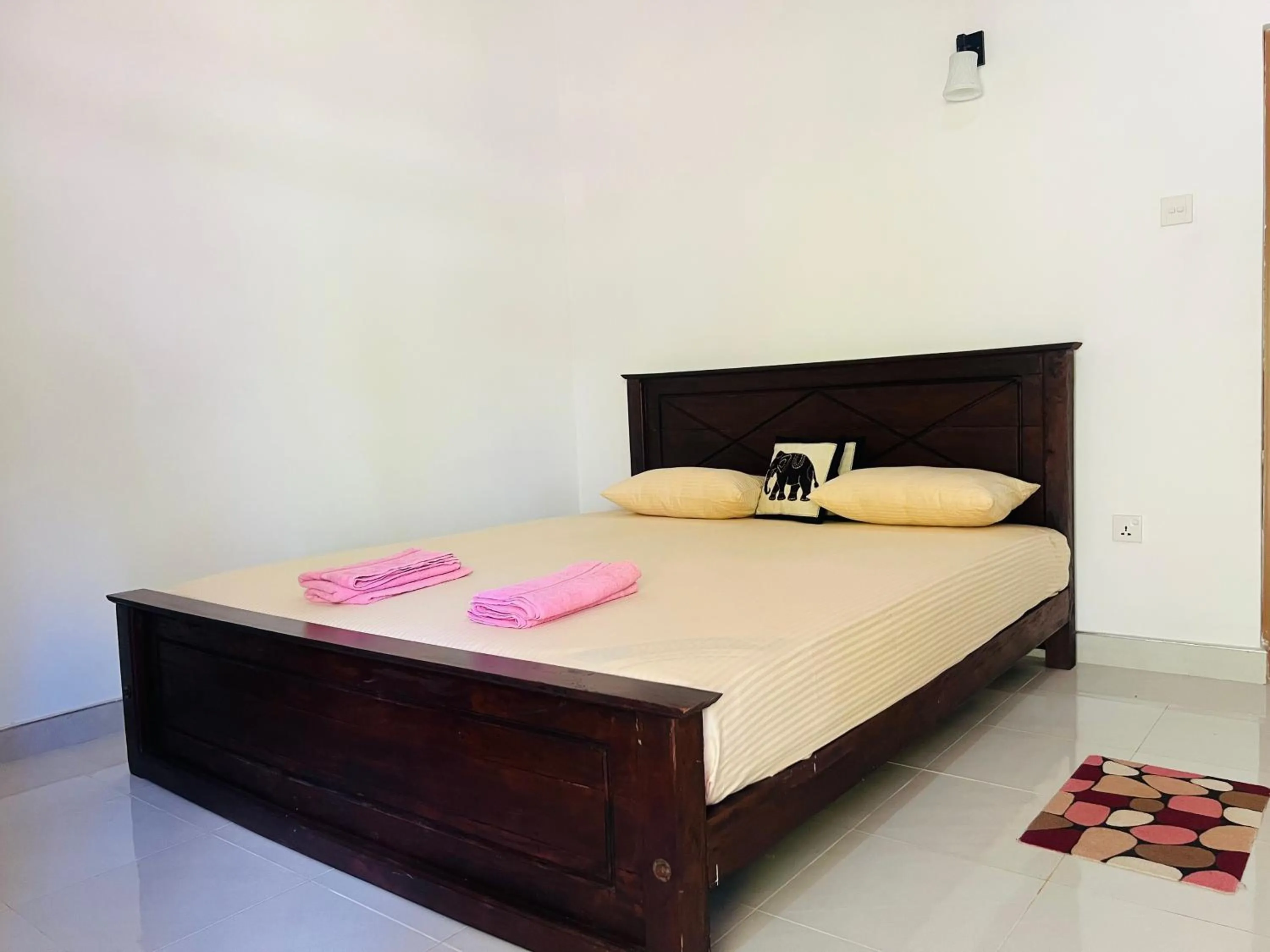 Photo of the whole room, Bed in Harini Villa