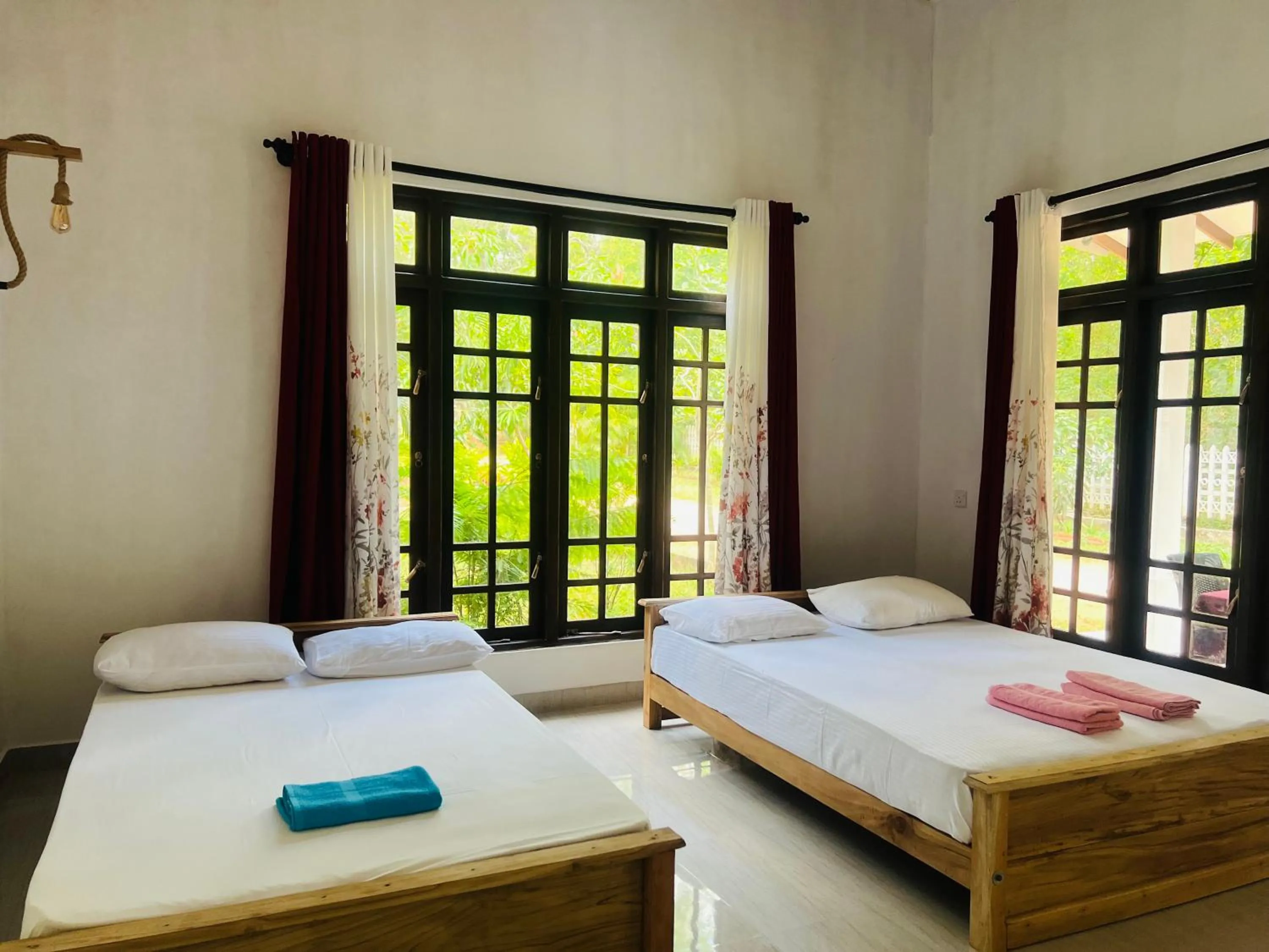 Photo of the whole room, Bed in Harini Villa
