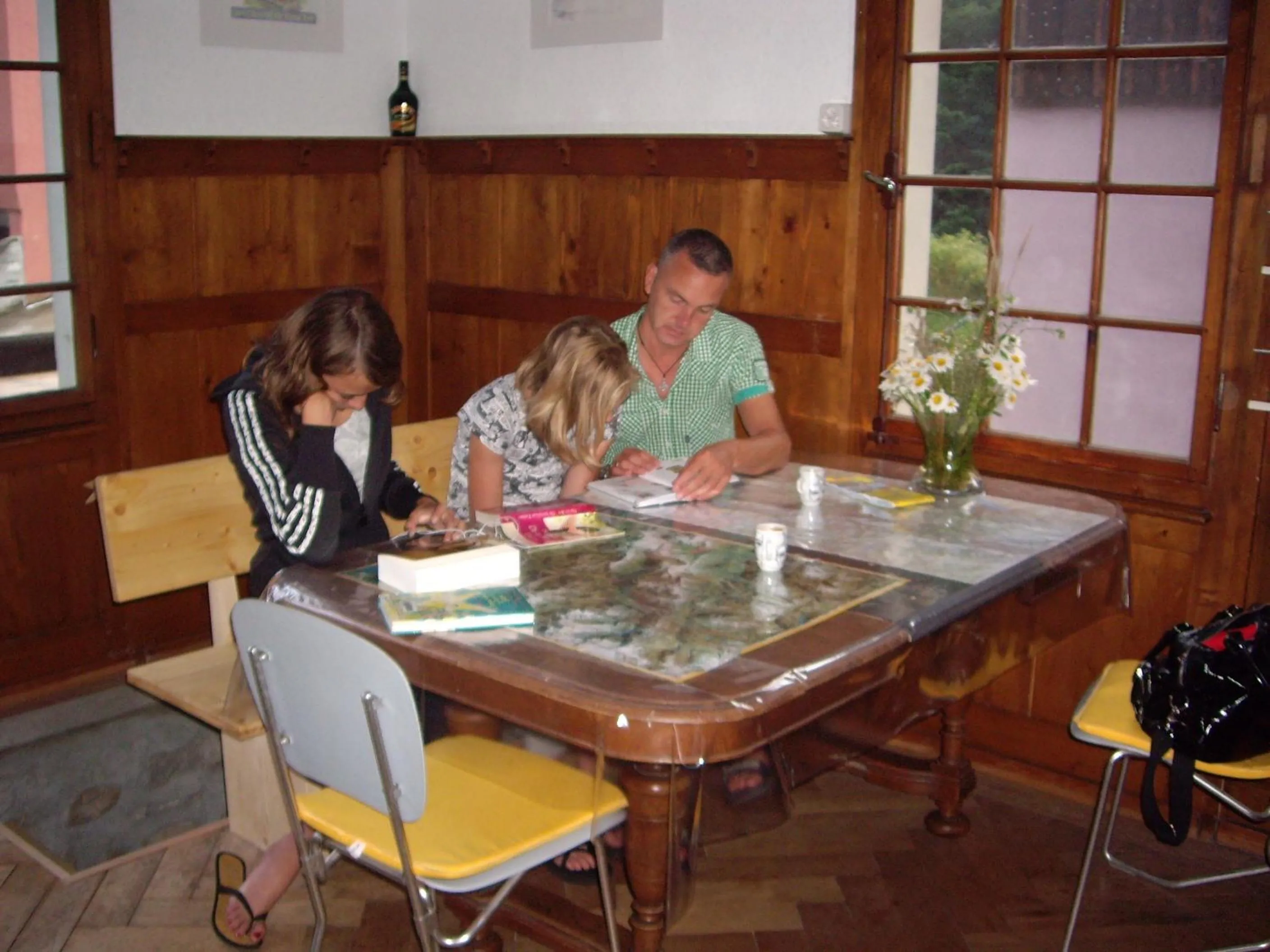 Communal lounge/ TV room in Gotthard Backpacker