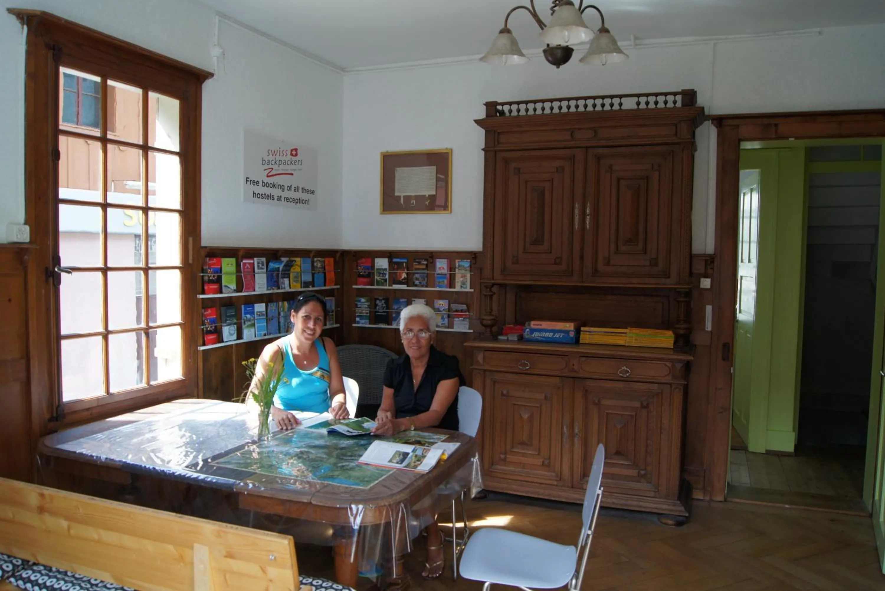 Communal lounge/ TV room in Gotthard Backpacker
