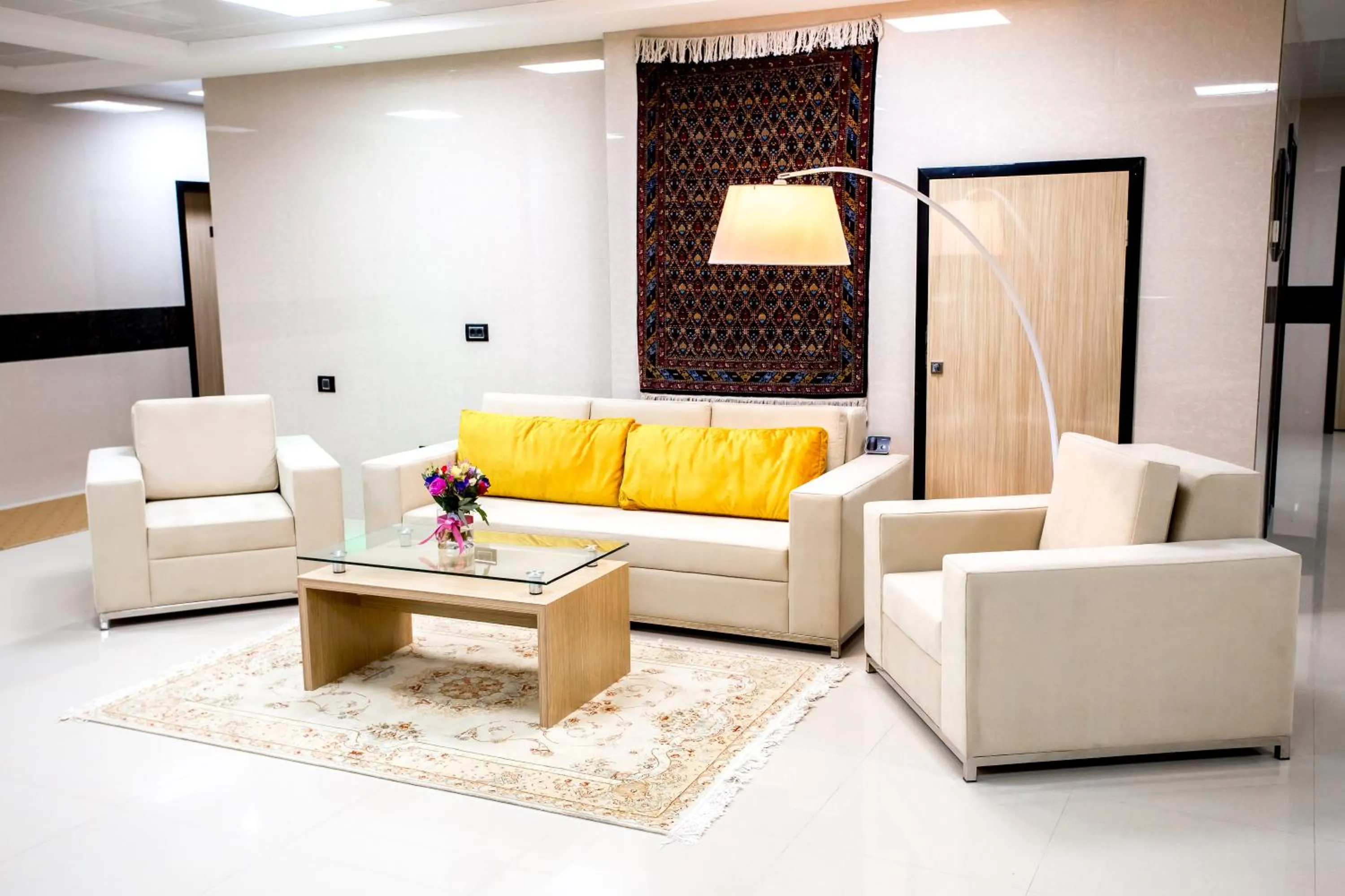 Communal lounge/ TV room in West Shine Hotel