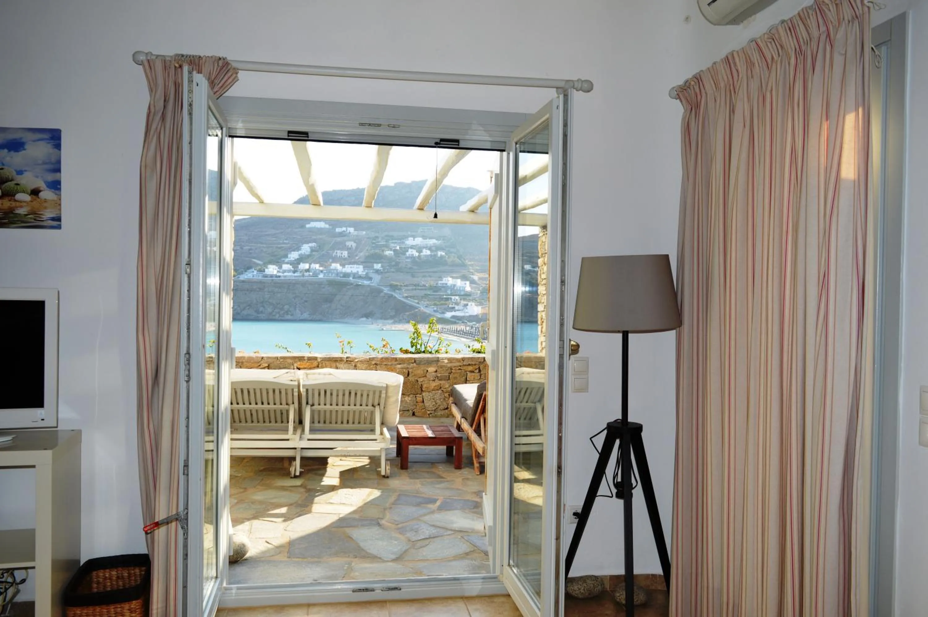 Patio, Bed in Sea Side Studios & Houses