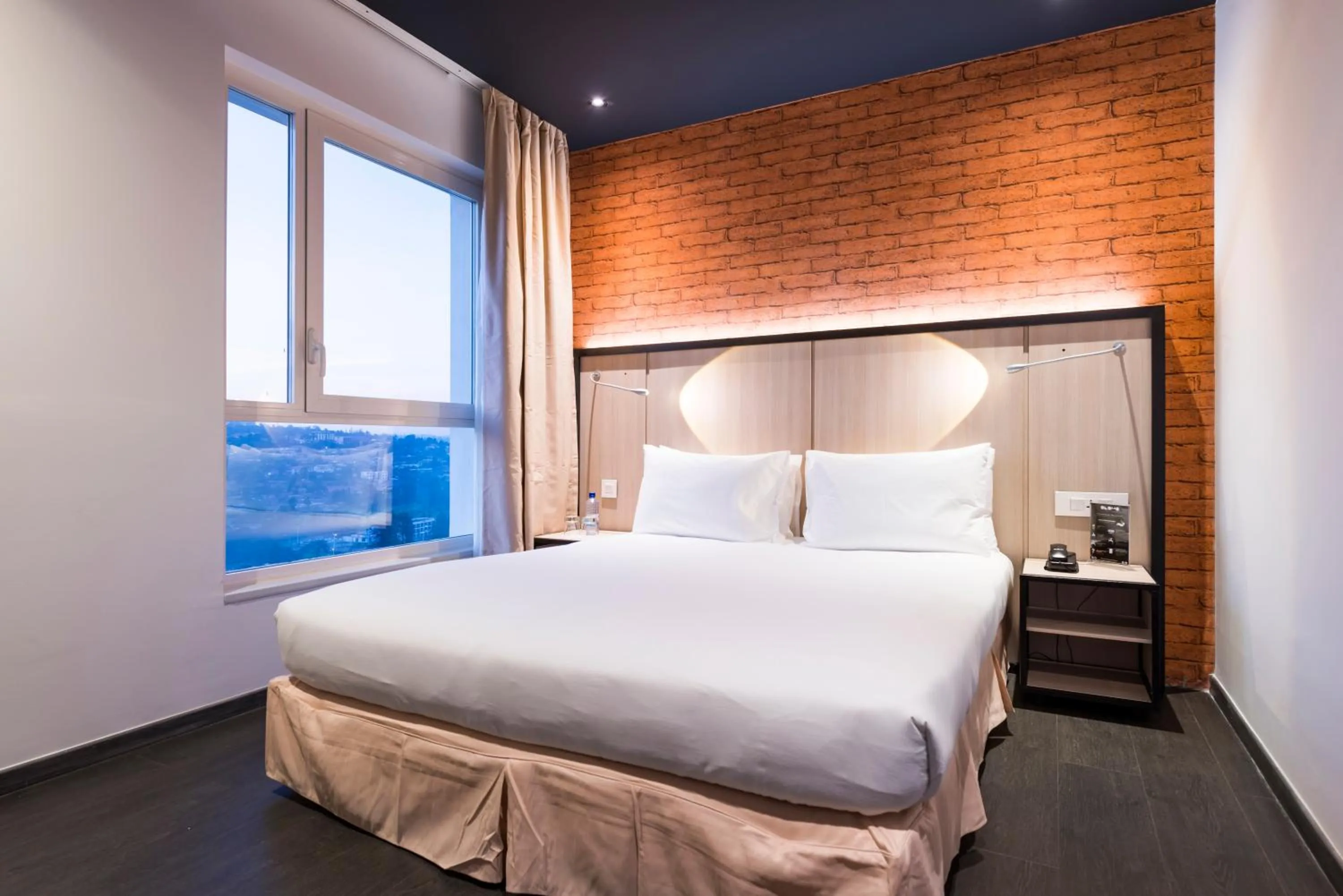 Bedroom, Bed in Onomo Hotel Kigali