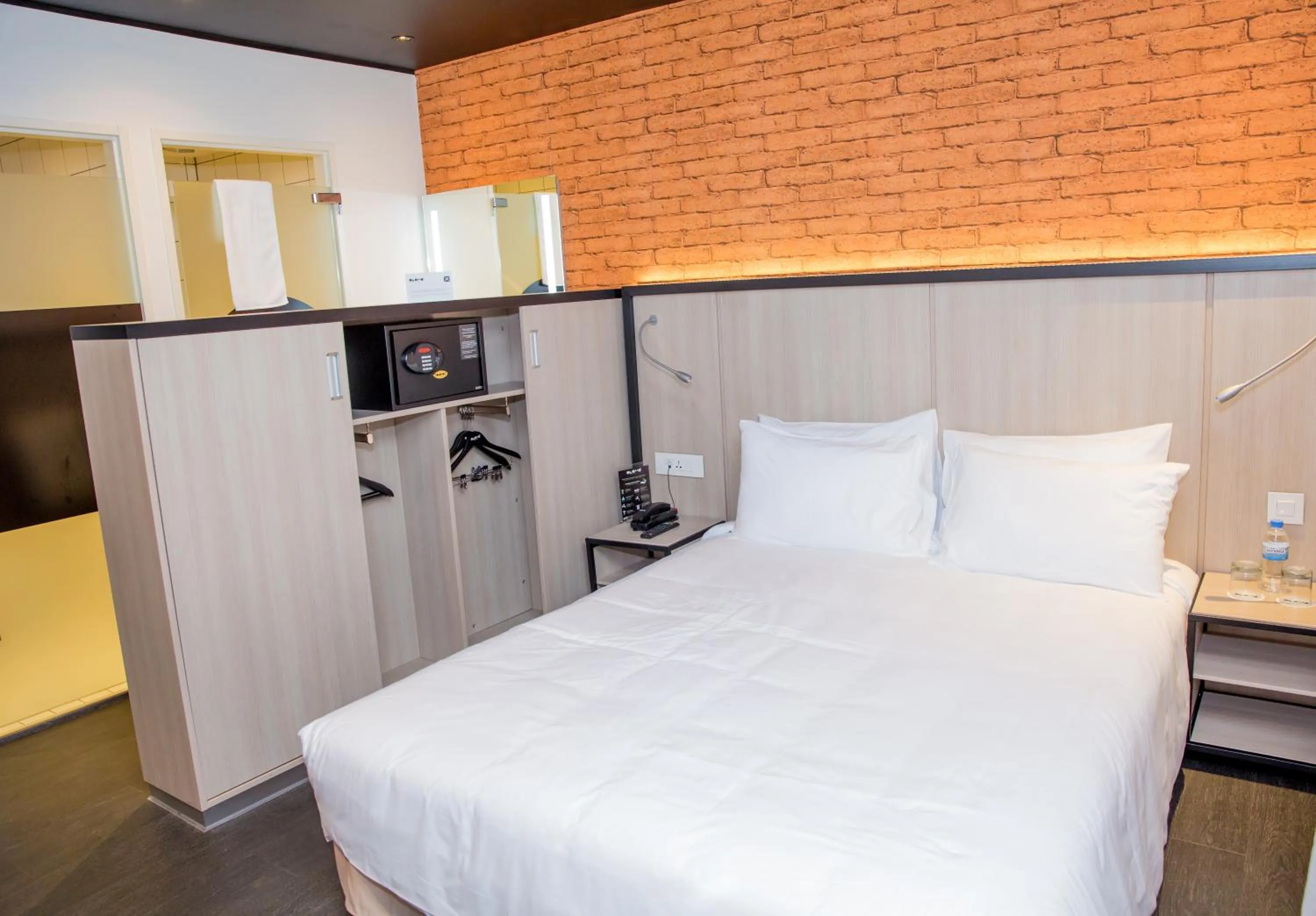 Bedroom, Bed in Onomo Hotel Kigali