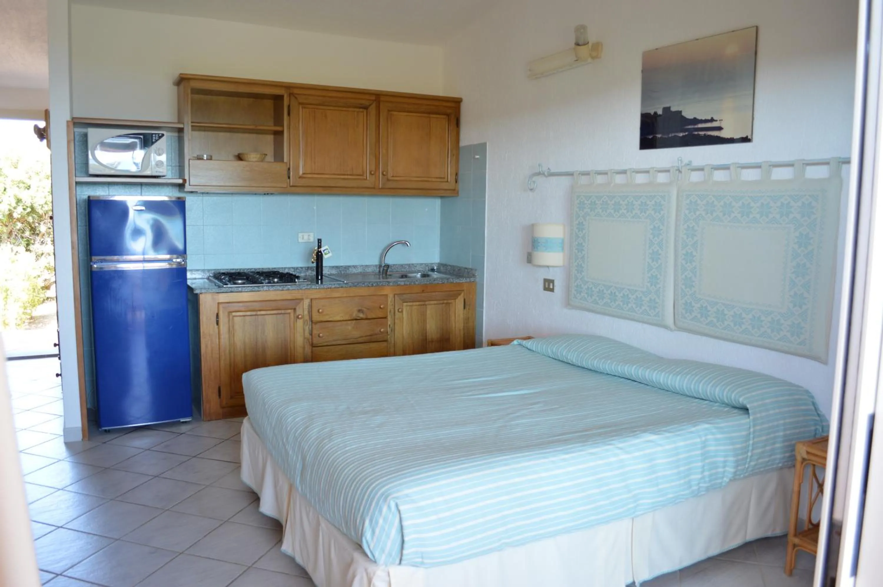 Photo of the whole room, Bed in Residence Fenicia