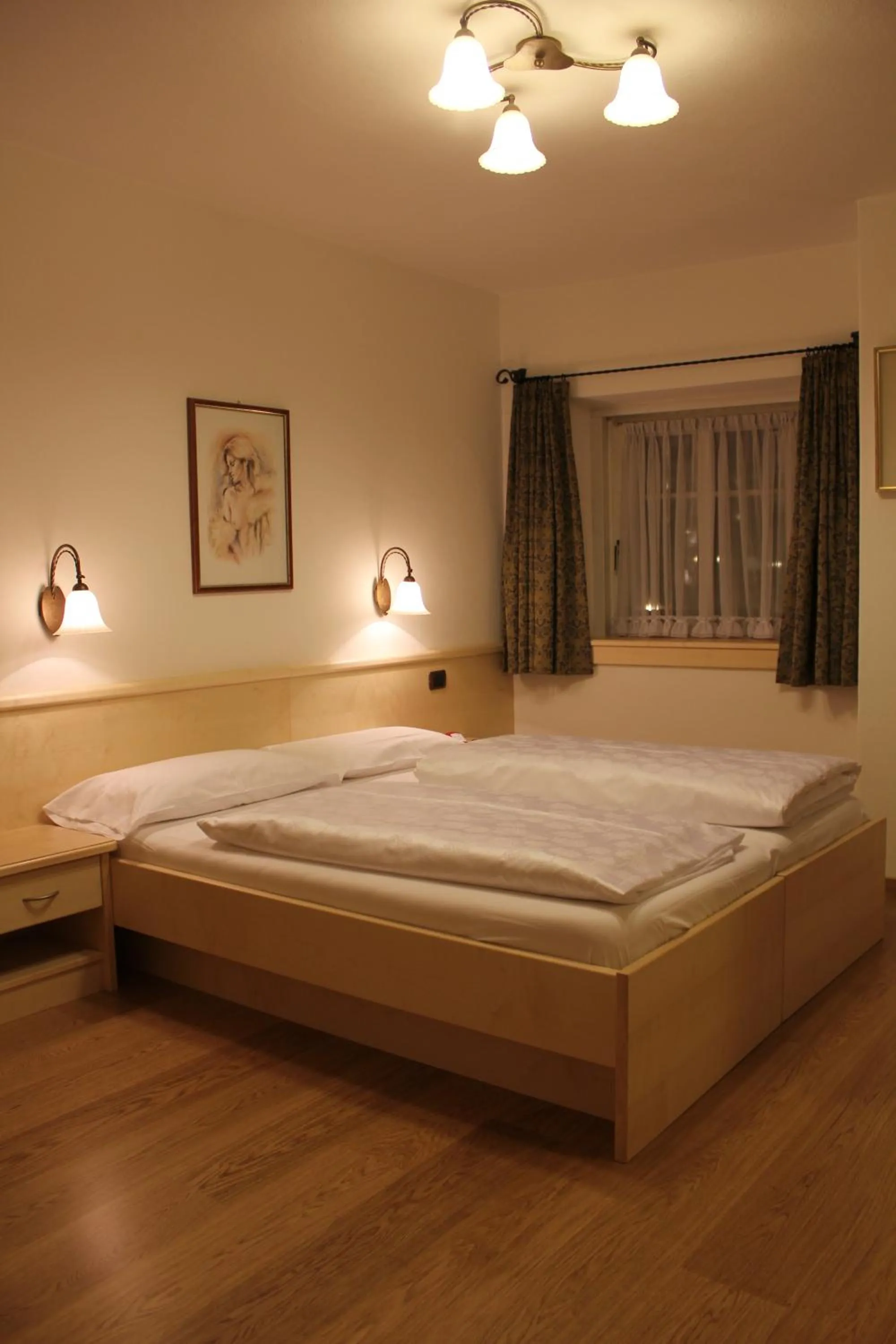 Bed in Hotel Garni Snaltnerhof