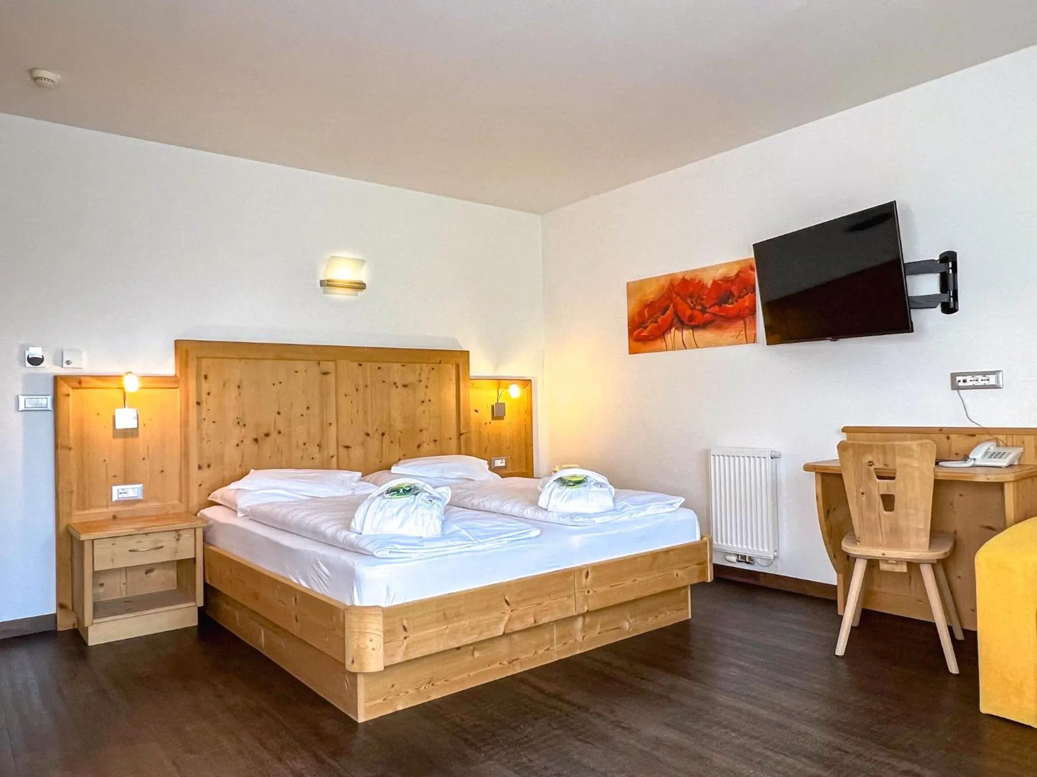Bed in Garni Hotel Bel Vert