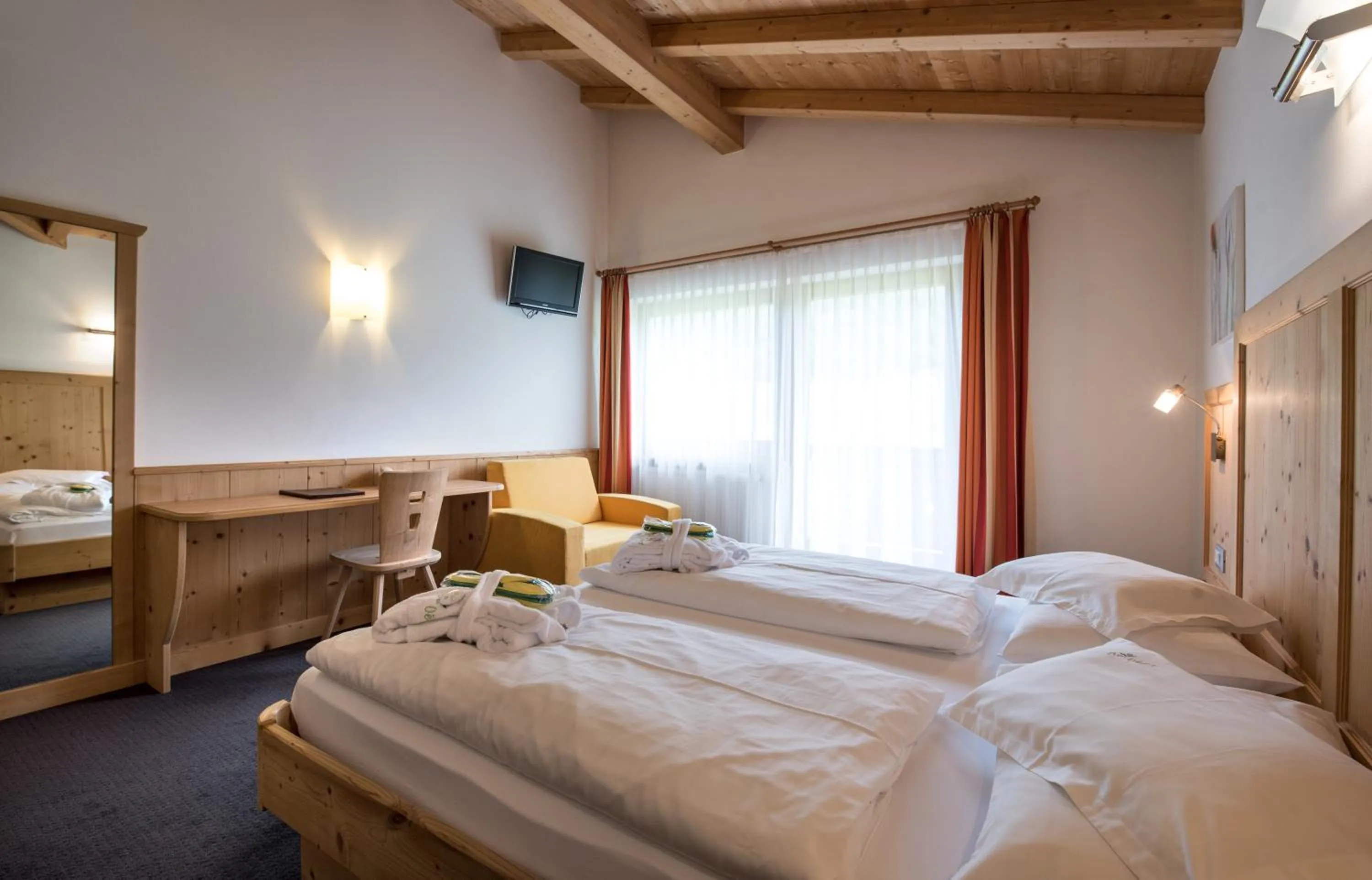 Photo of the whole room, Bed in Garni Hotel Bel Vert