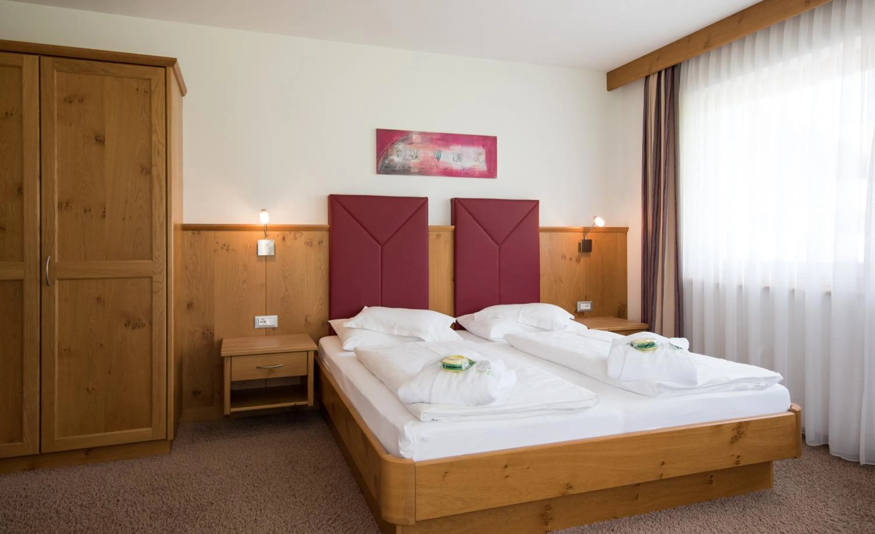 Photo of the whole room, Bed in Garni Hotel Bel Vert