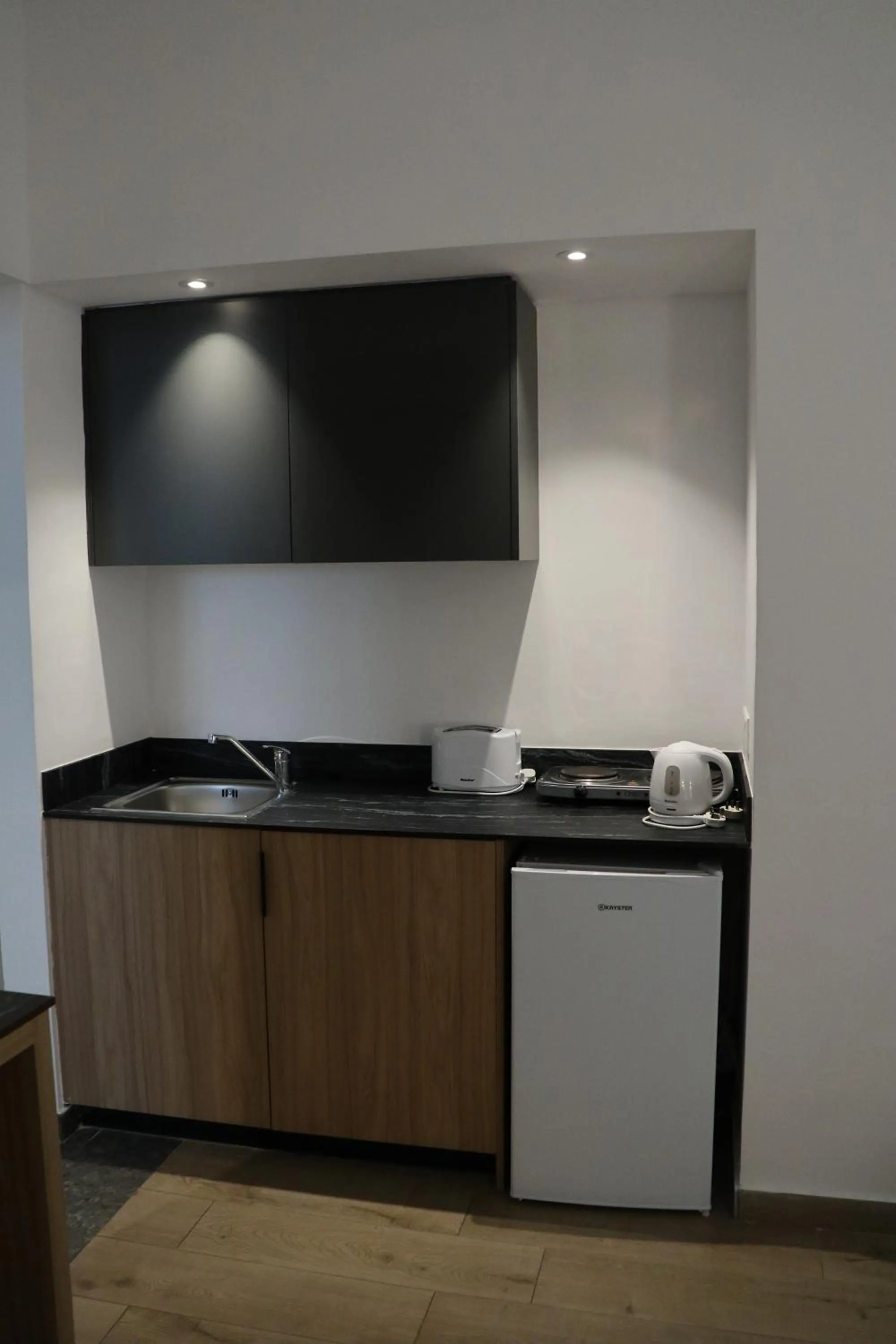 Kitchen or kitchenette in Sunflower Hotel Apartments