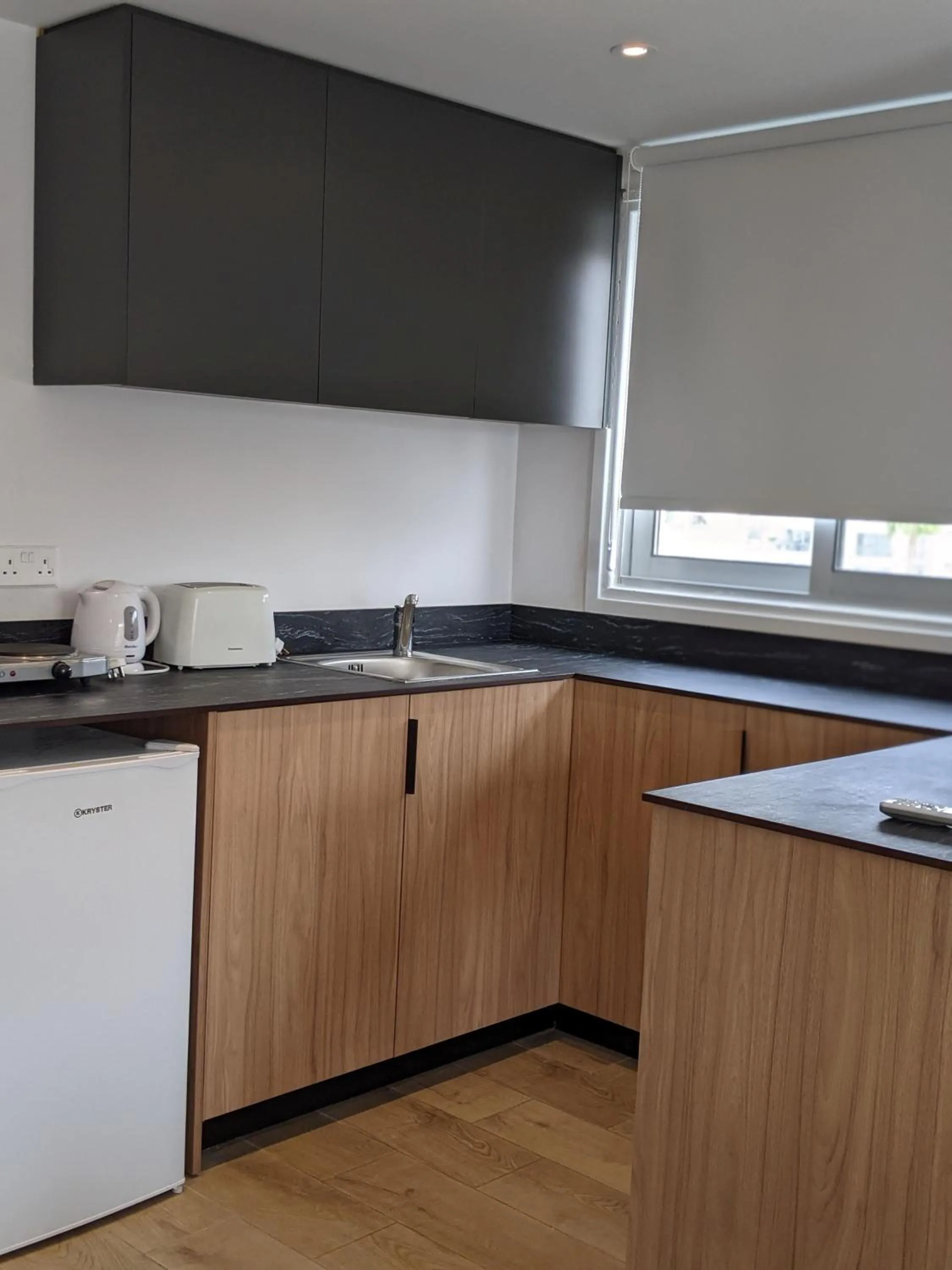Kitchen or kitchenette in Sunflower Hotel Apartments