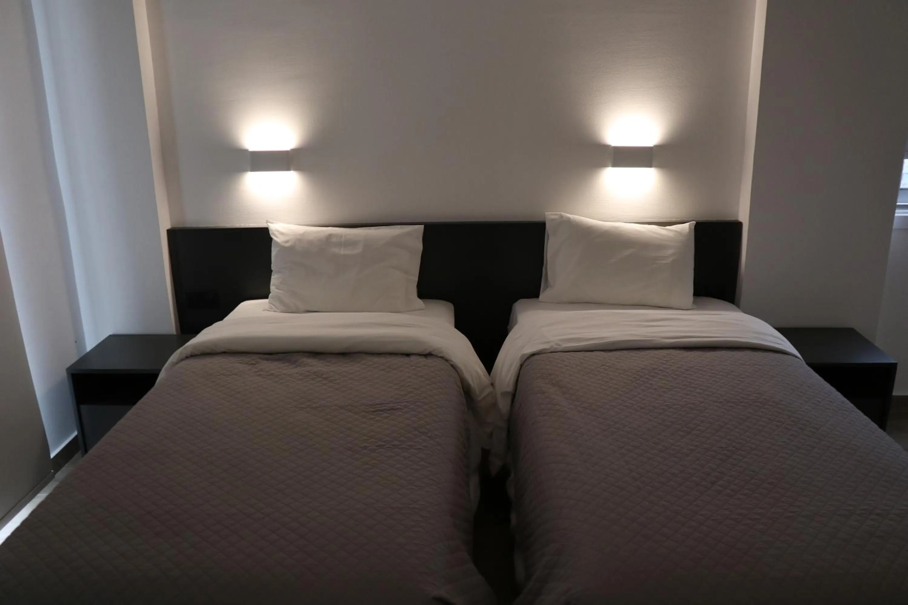 Bed in Sunflower Hotel Apartments