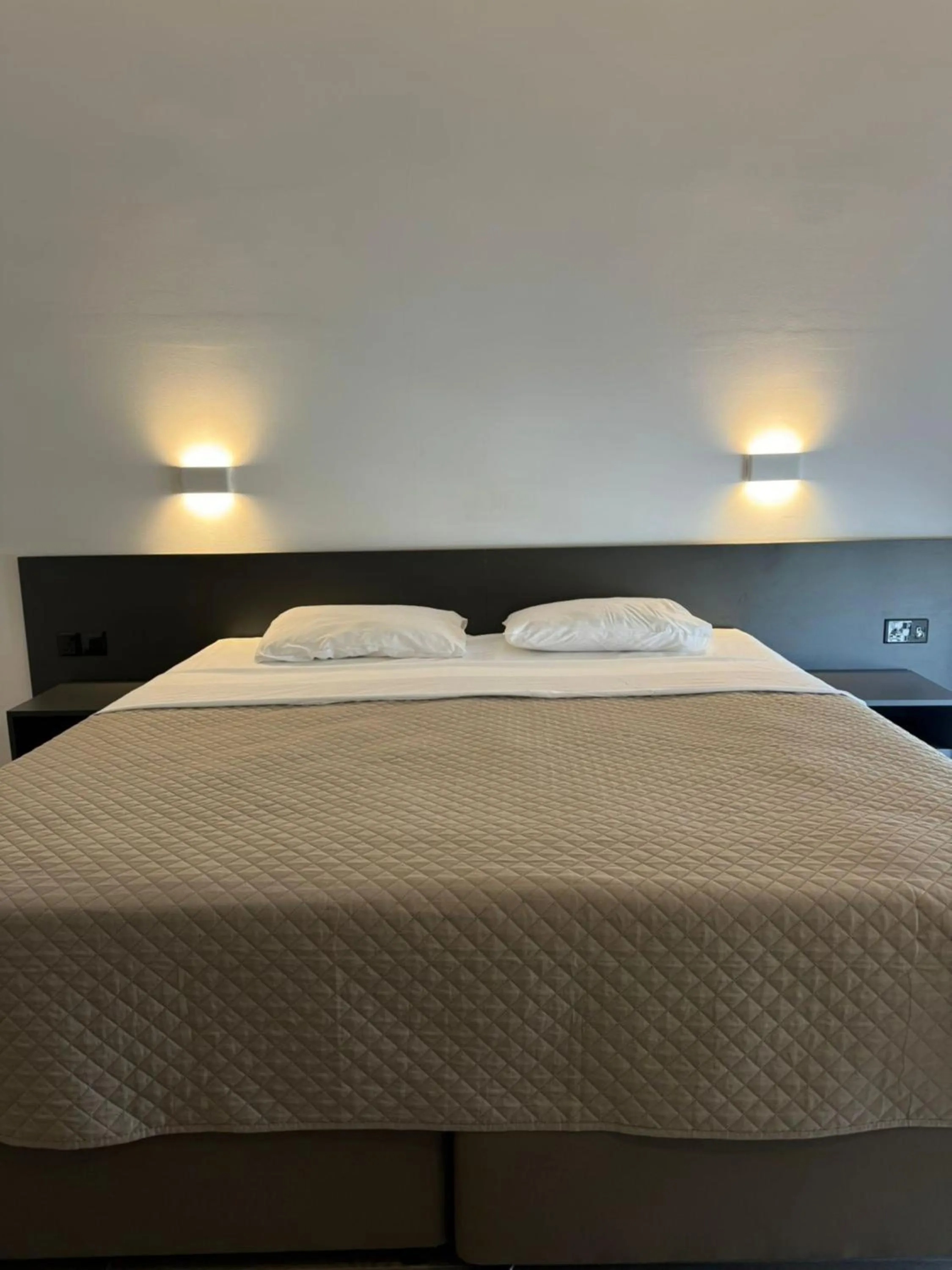 Bed in Sunflower Hotel Apartments