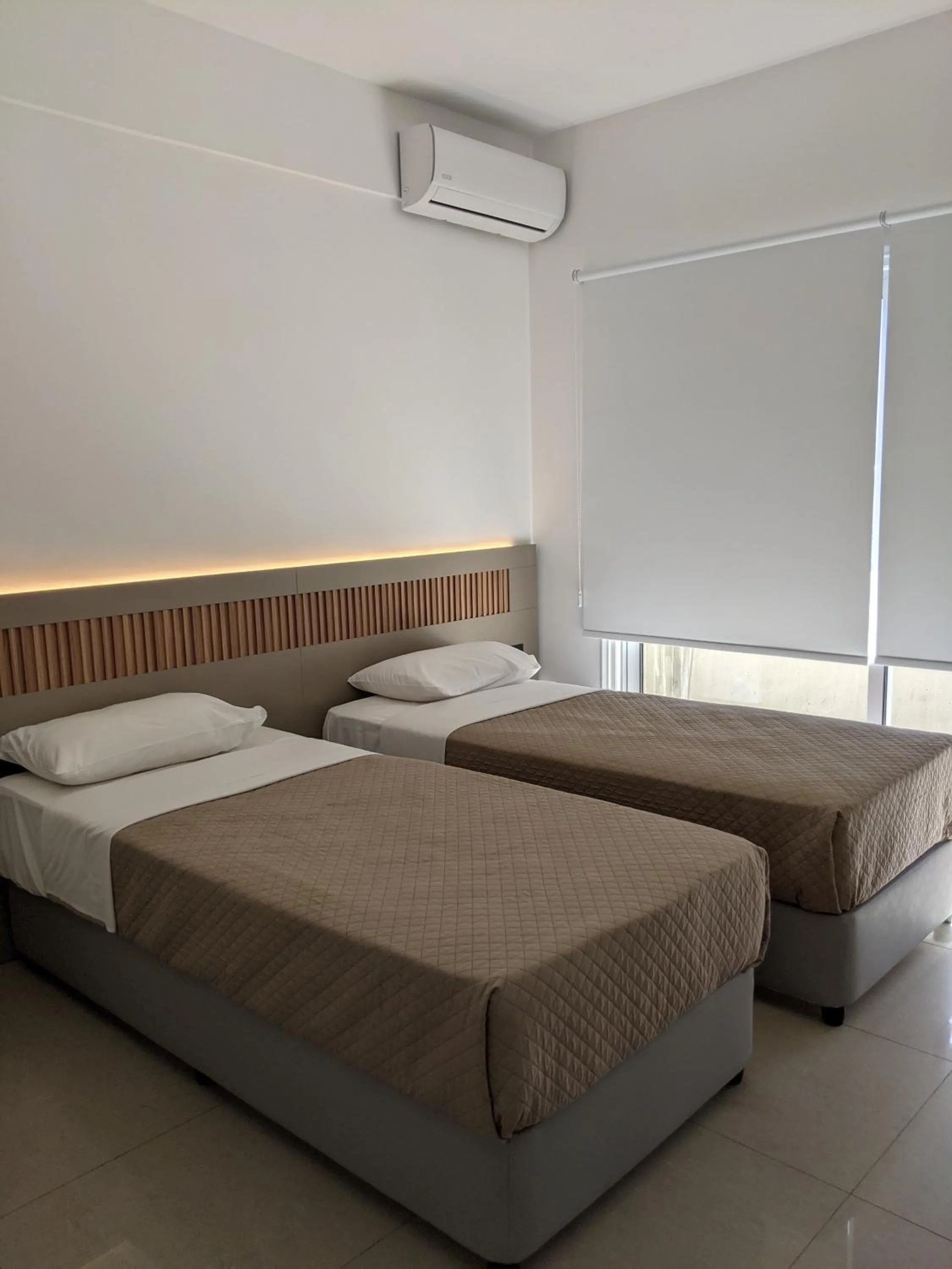 Bed in Sunflower Hotel Apartments