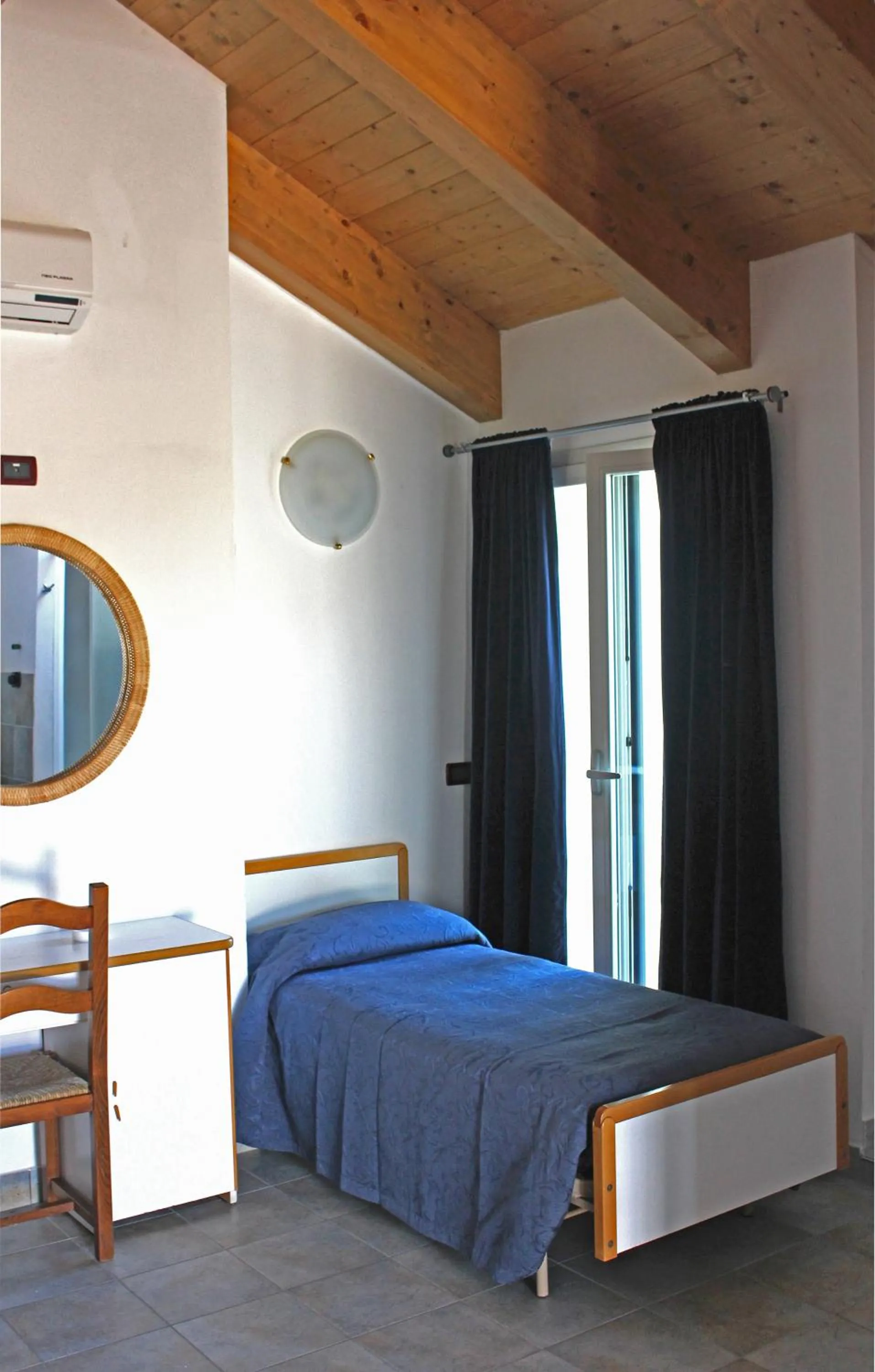 Bed in Hotel Corallo