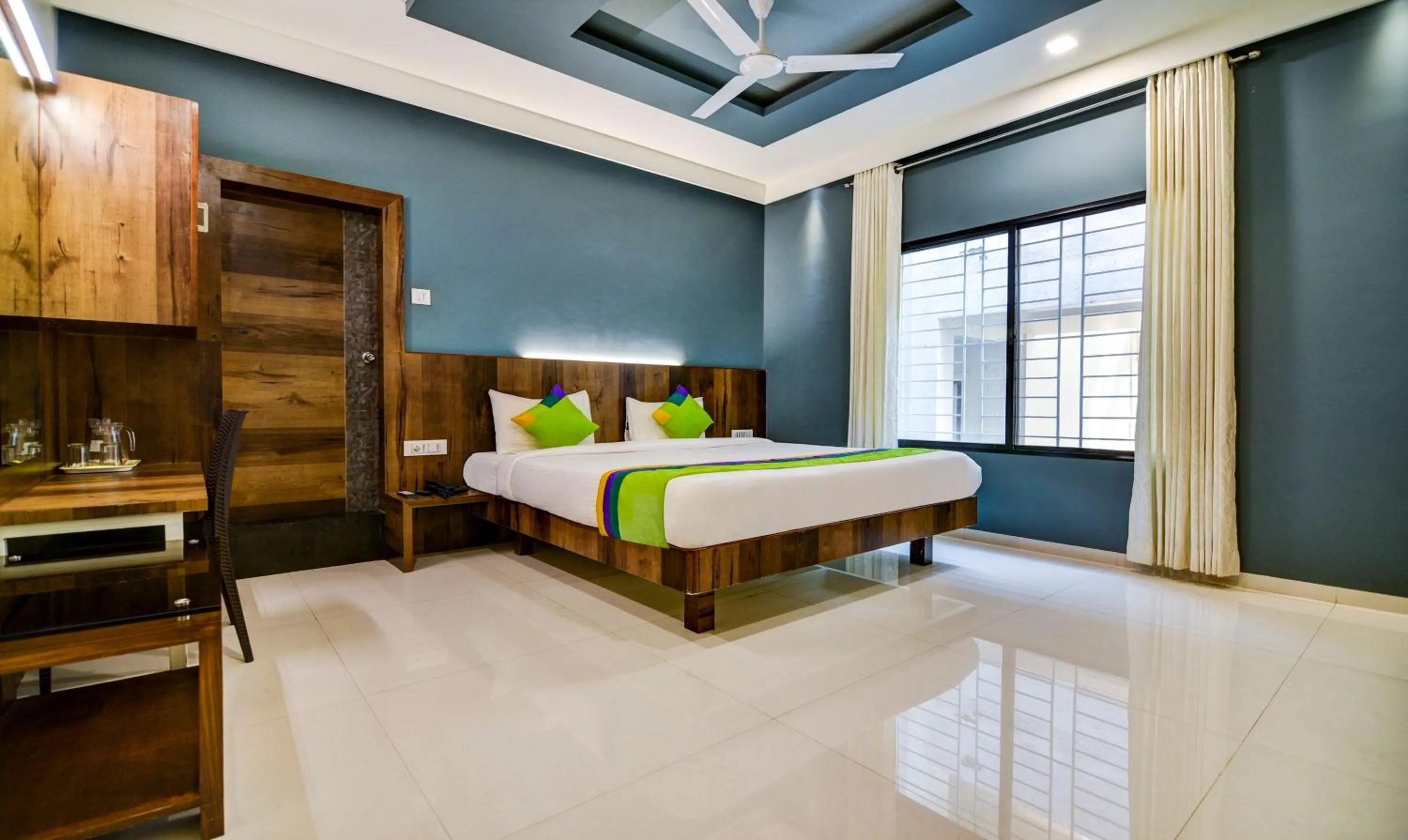 Bedroom, Bed in Treebo Shree Sai Suites