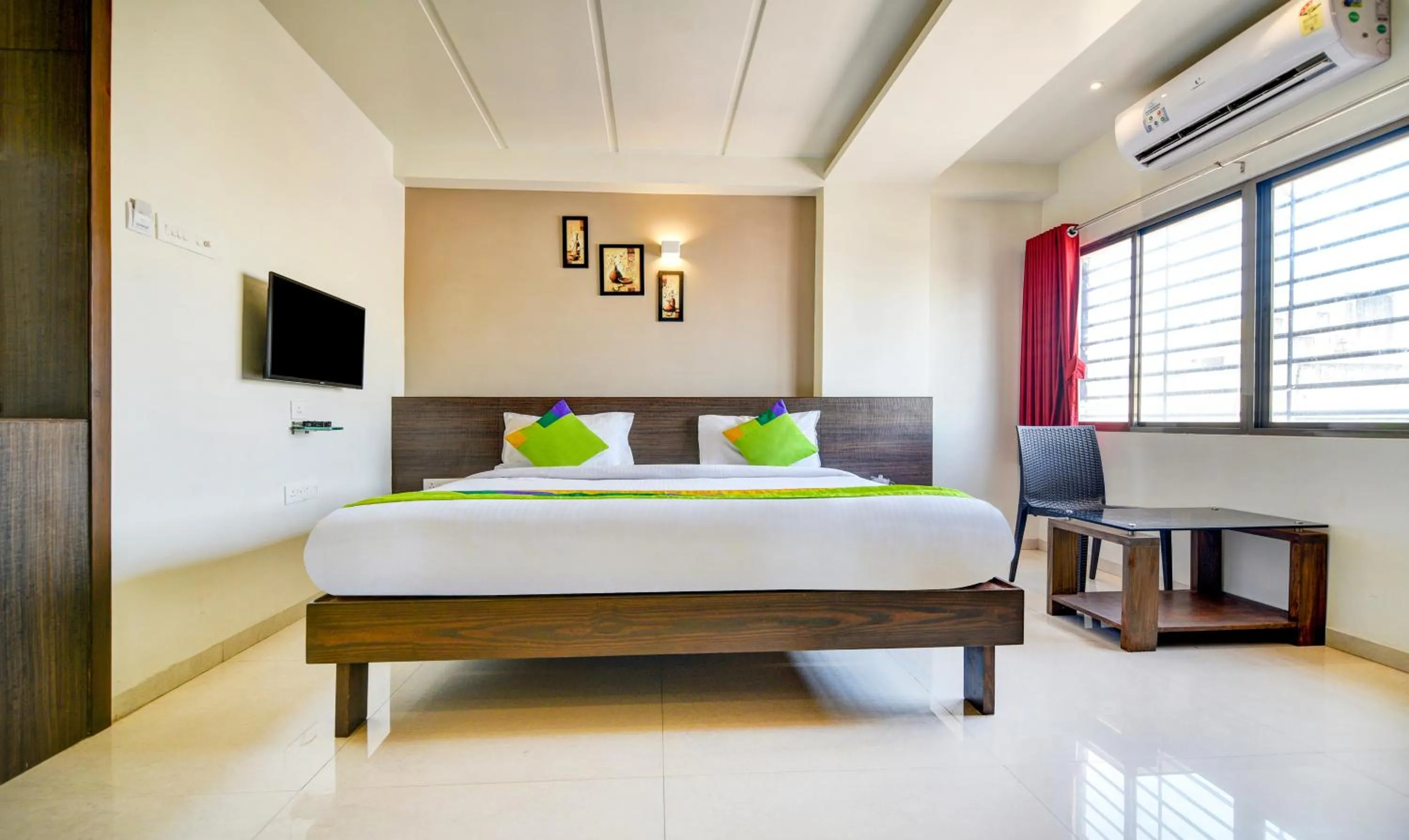 Bedroom, Bed in Treebo Shree Sai Suites